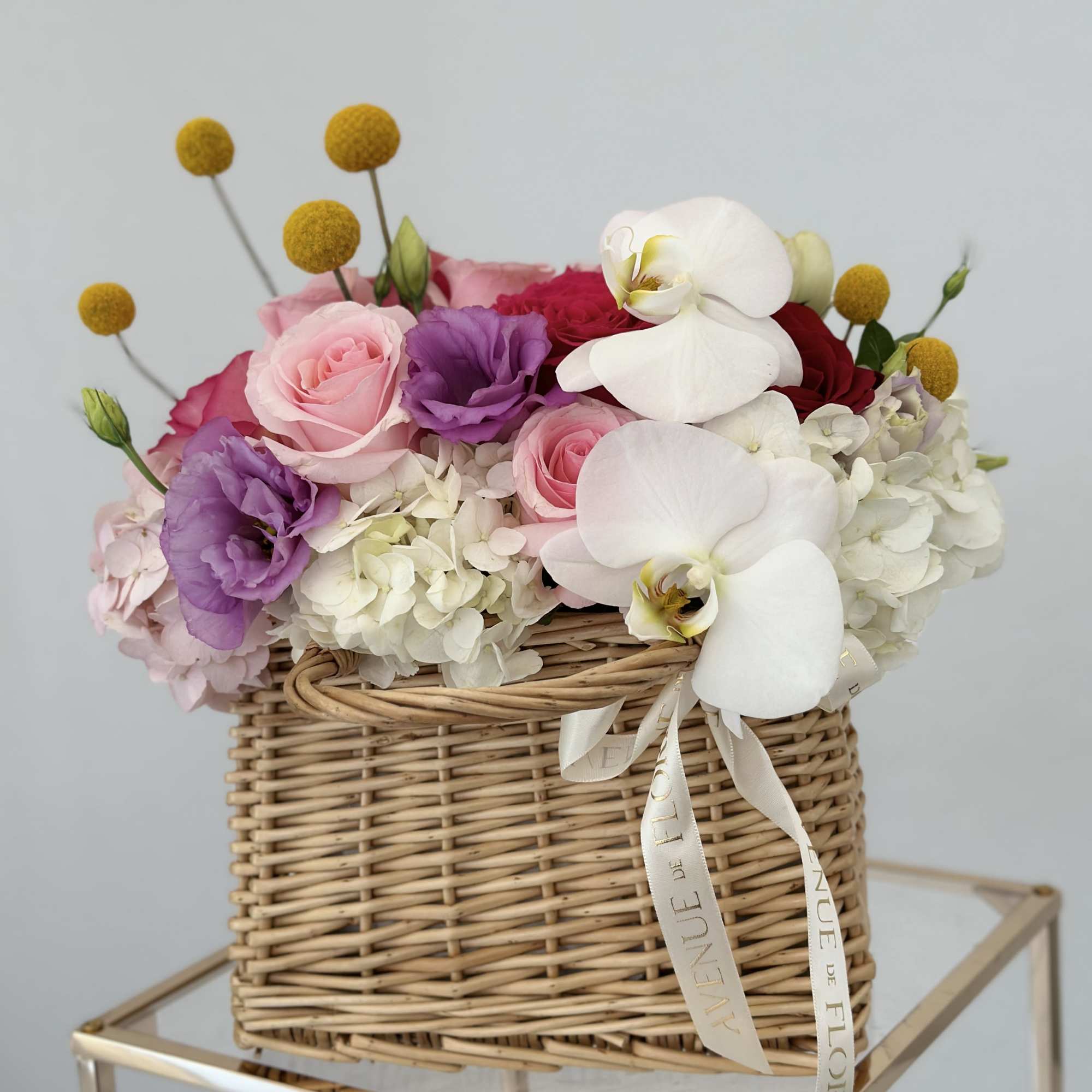 Enhance any occasion with this stunning arrangement, featuring a beautiful blend roses