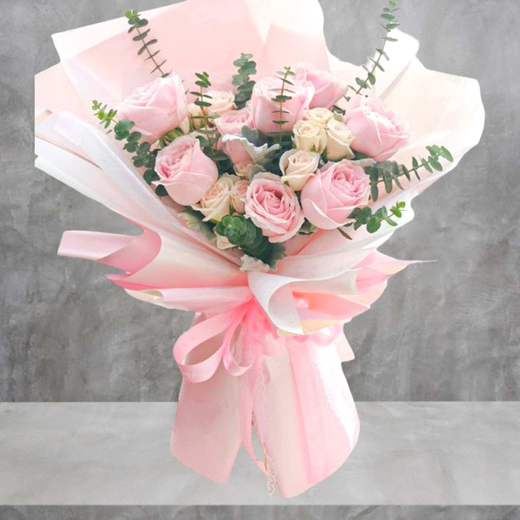 Send this beautiful, wrapped bouquet of pink roses to someone special. Perfect