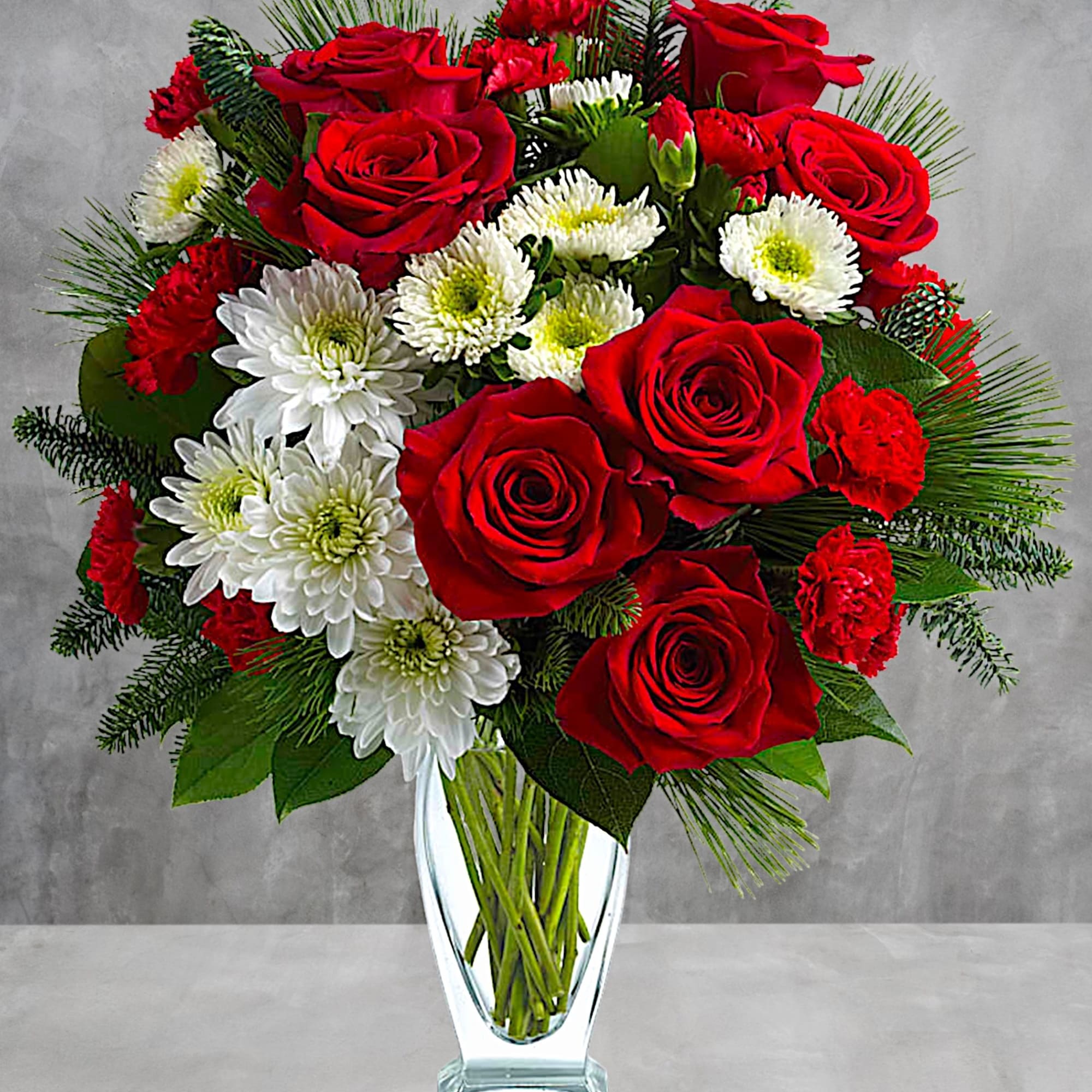 No mistletoe required! Simply send this romantic arrangement of snow whites and