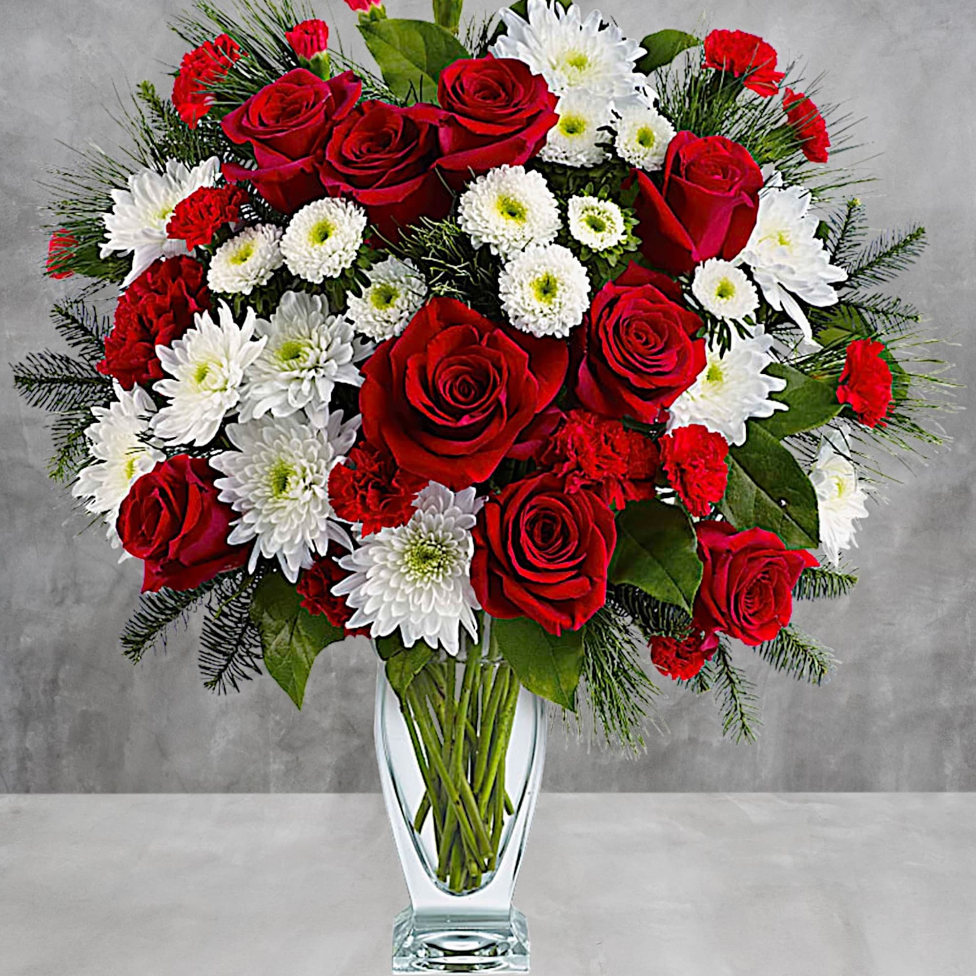 No mistletoe required! Simply send this romantic arrangement of snow whites and