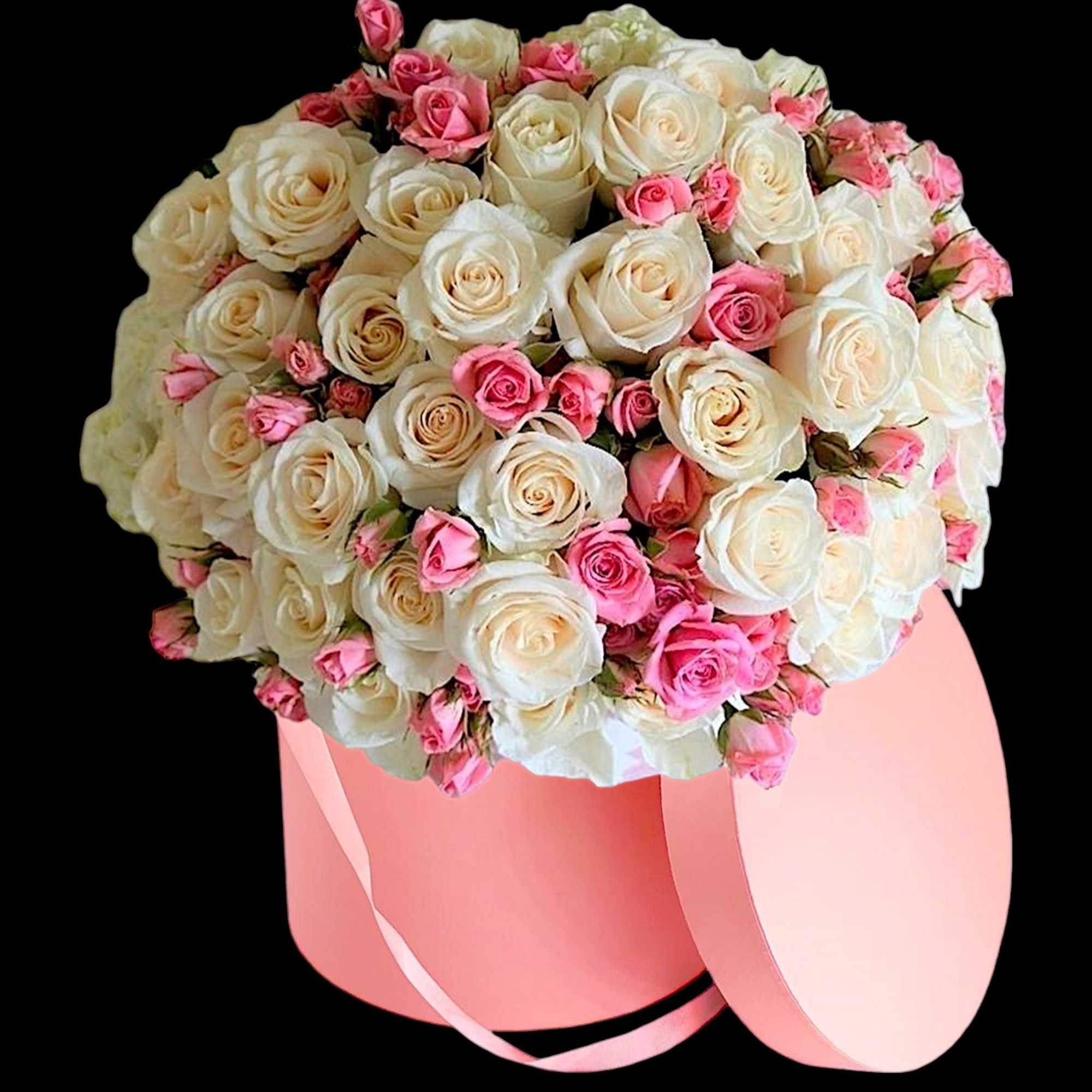 A modern flower arrangement in a cylinder box filled with roses.

DETAILS
This cylinder