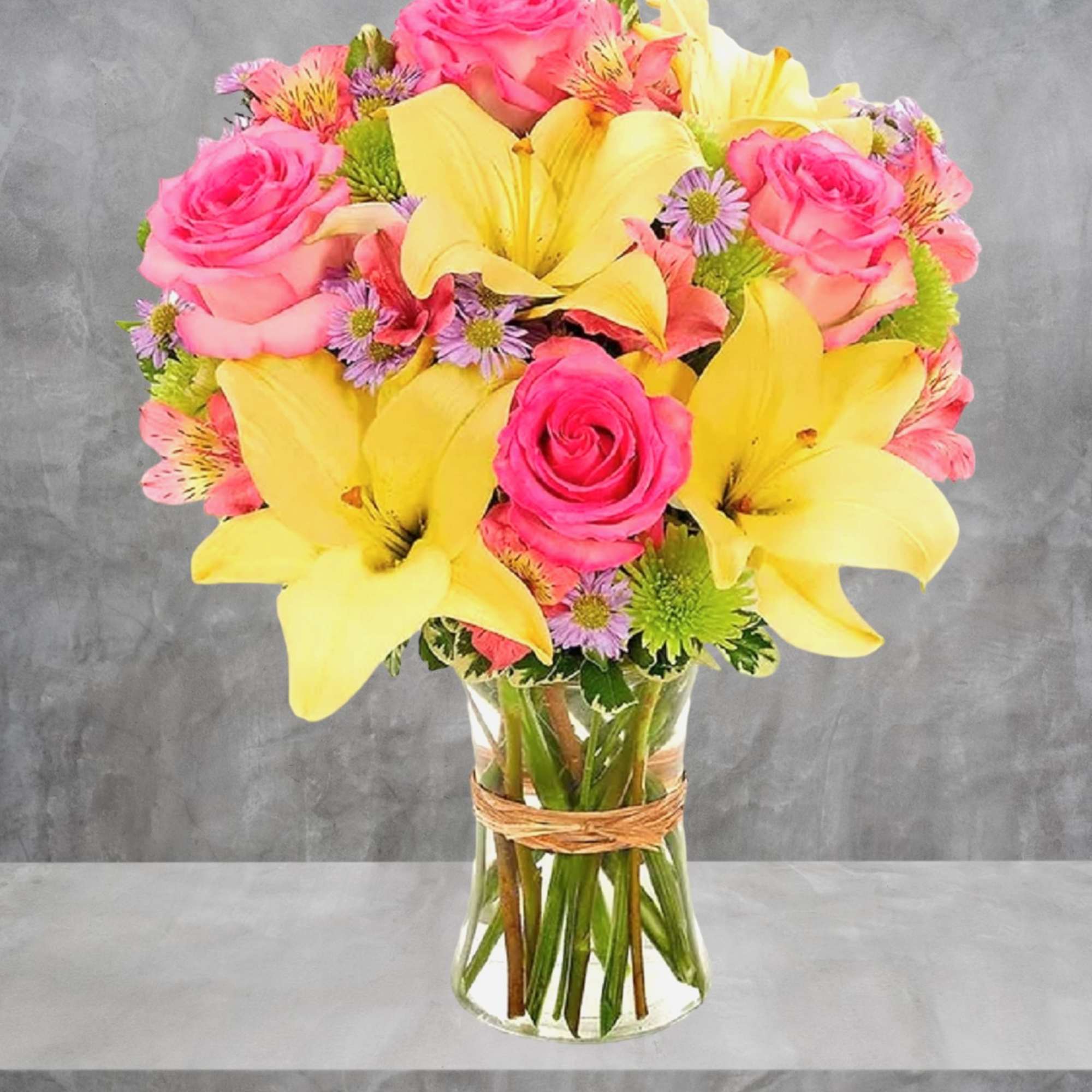 This bright and beautiful flower arrangement will brighten someone&#039;s day with a