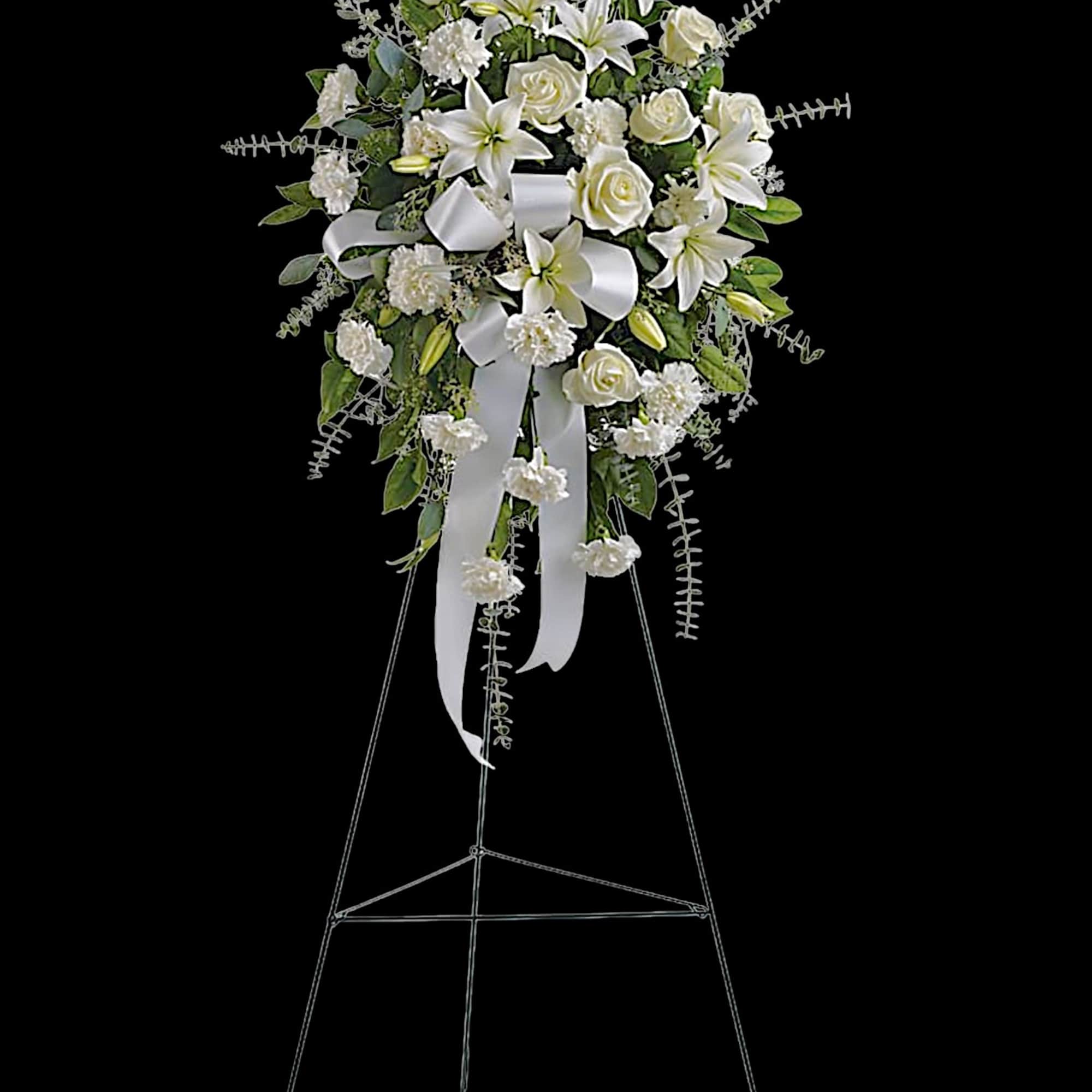 Stunning in its simplicity, this gorgeous spray of white roses, lilies and