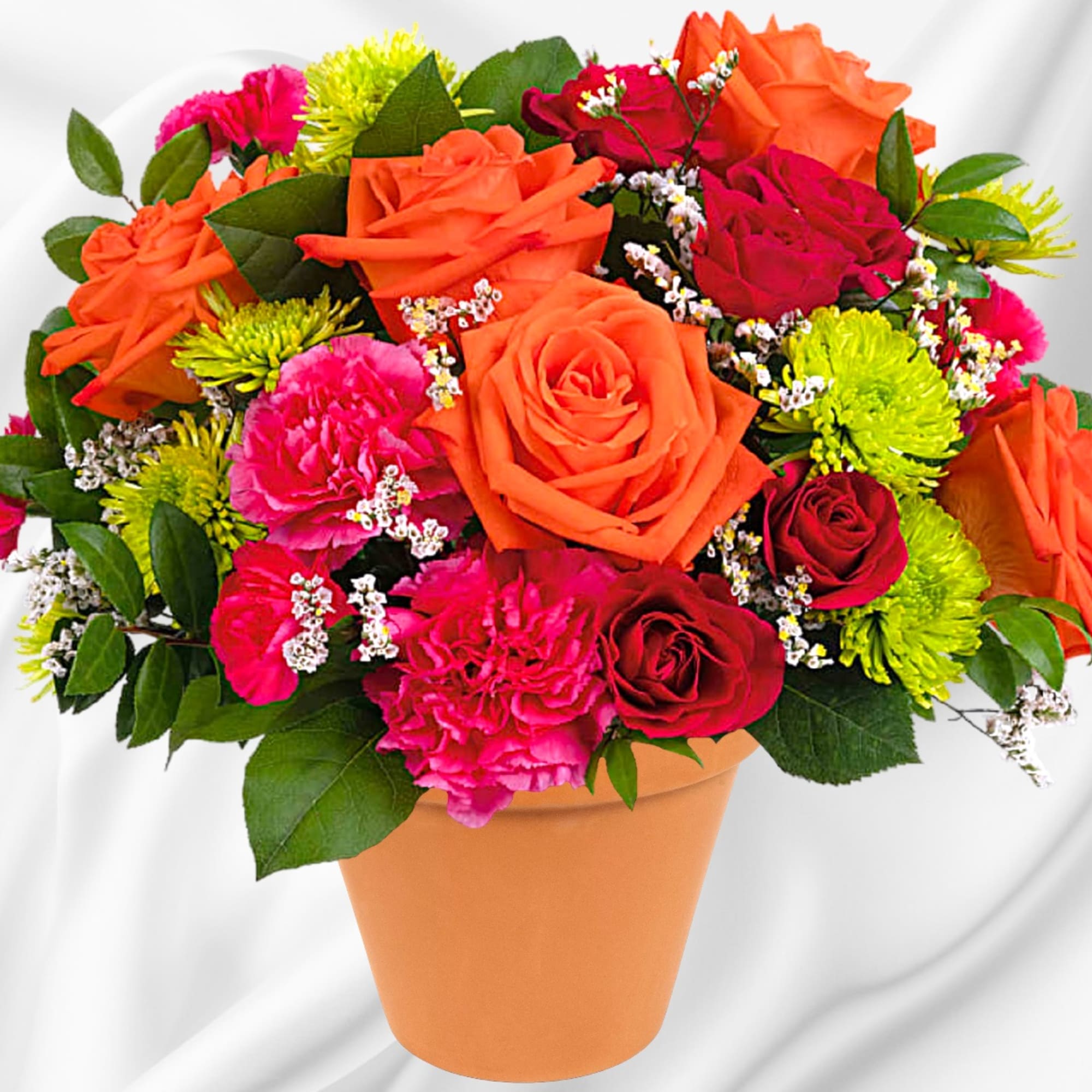 A dreamy dose of happiness, this beautiful orange and pink arrangement looks
