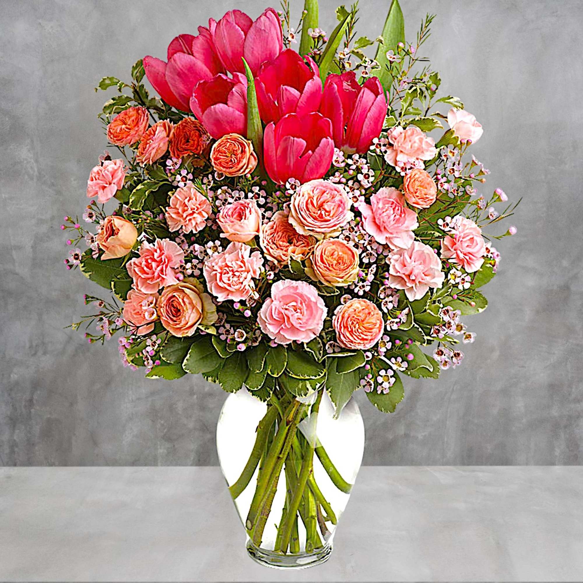 It&#039;s beauty-full! Bursting with tantalizing tulips and radiant roses, this delightful pink