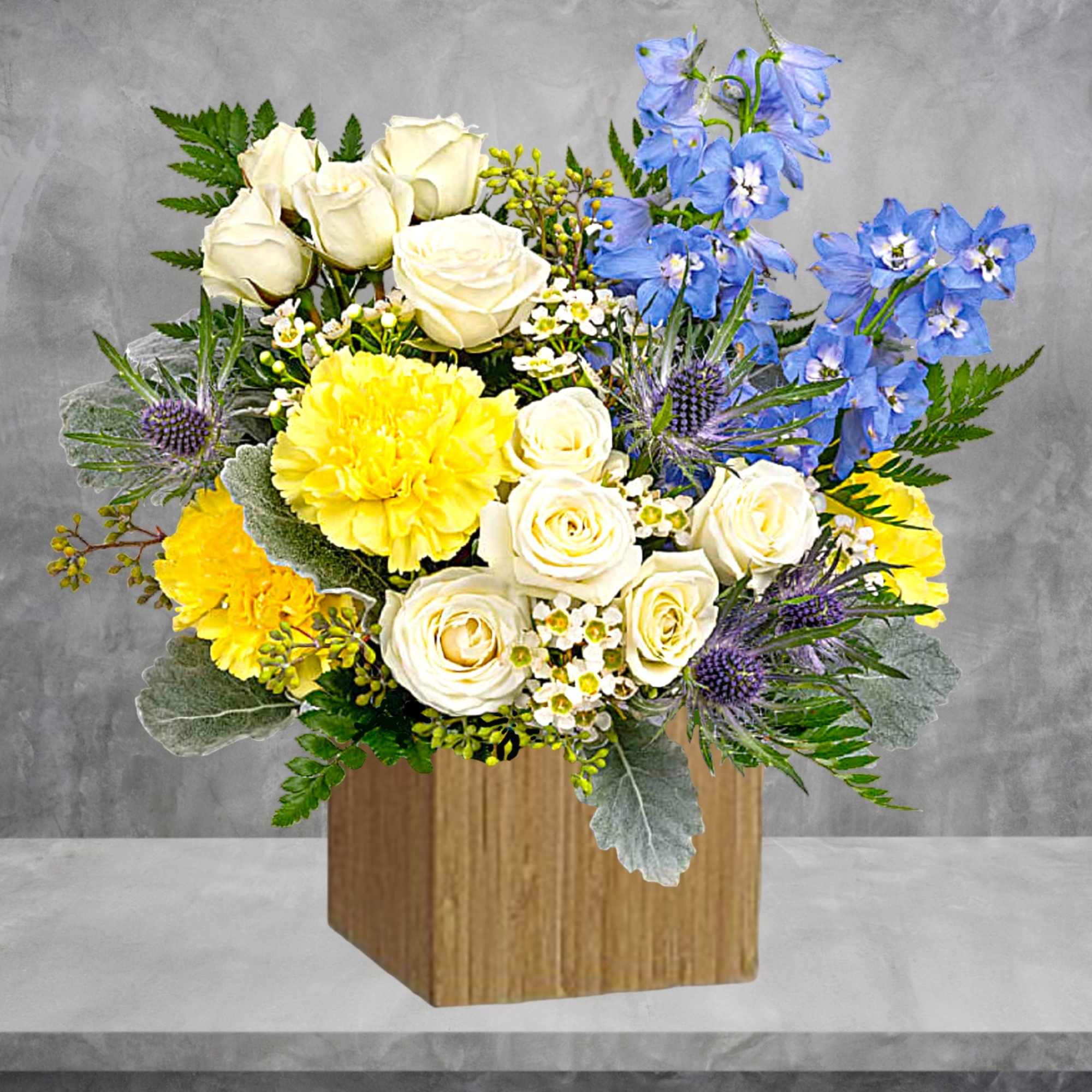 Like wispy clouds in a bright blue sky, this beautiful arrangement of