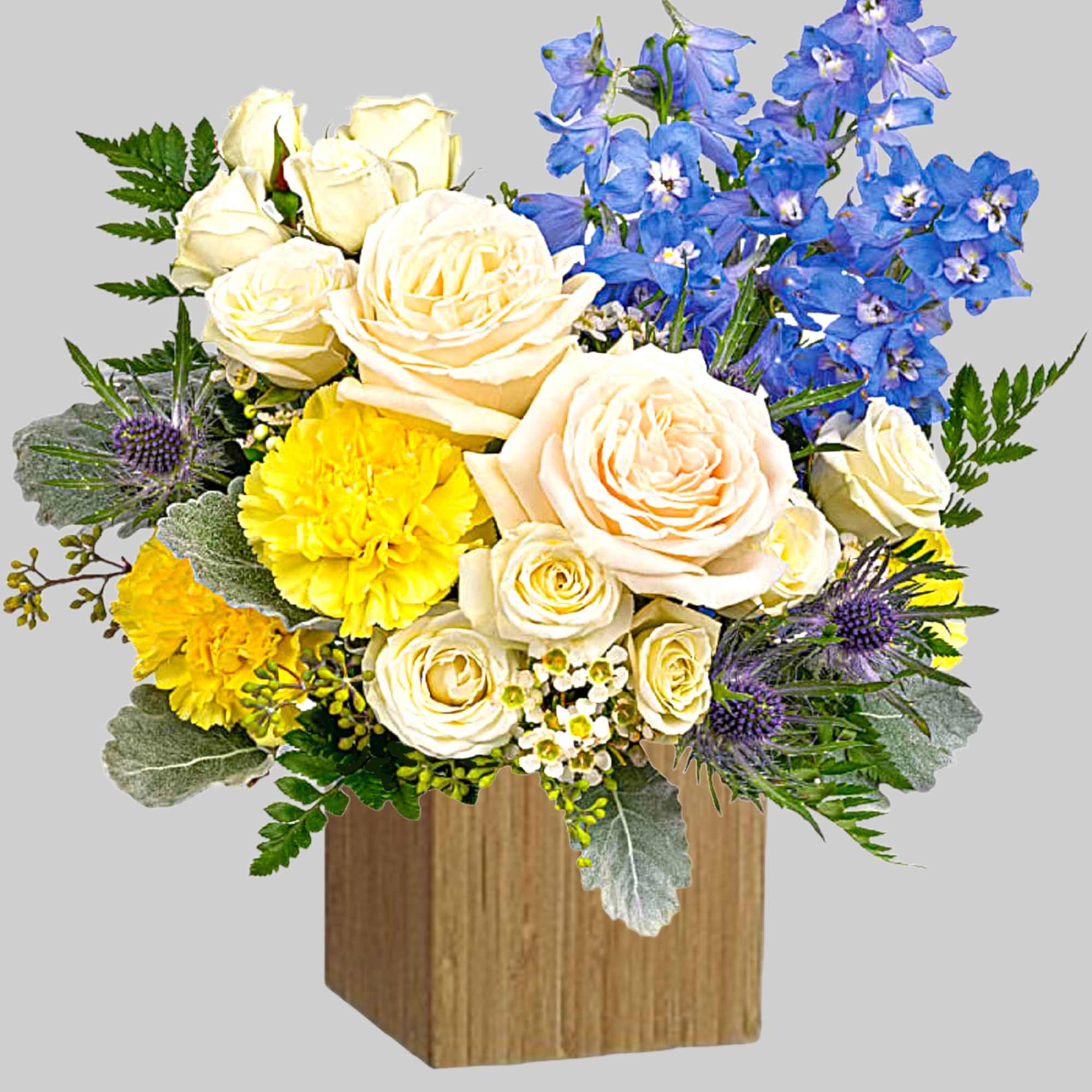 Like wispy clouds in a bright blue sky, this beautiful arrangement of