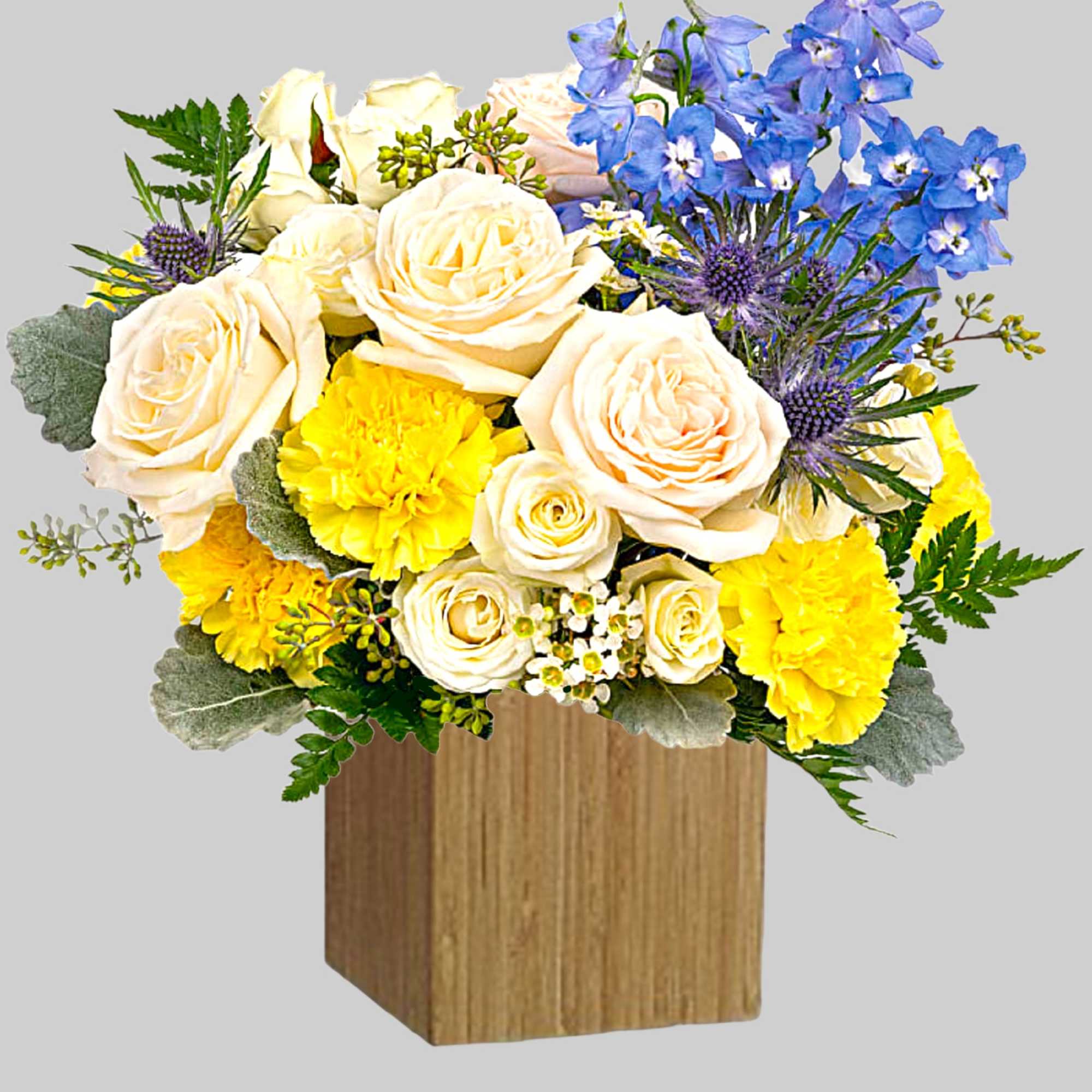 Like wispy clouds in a bright blue sky, this beautiful arrangement of