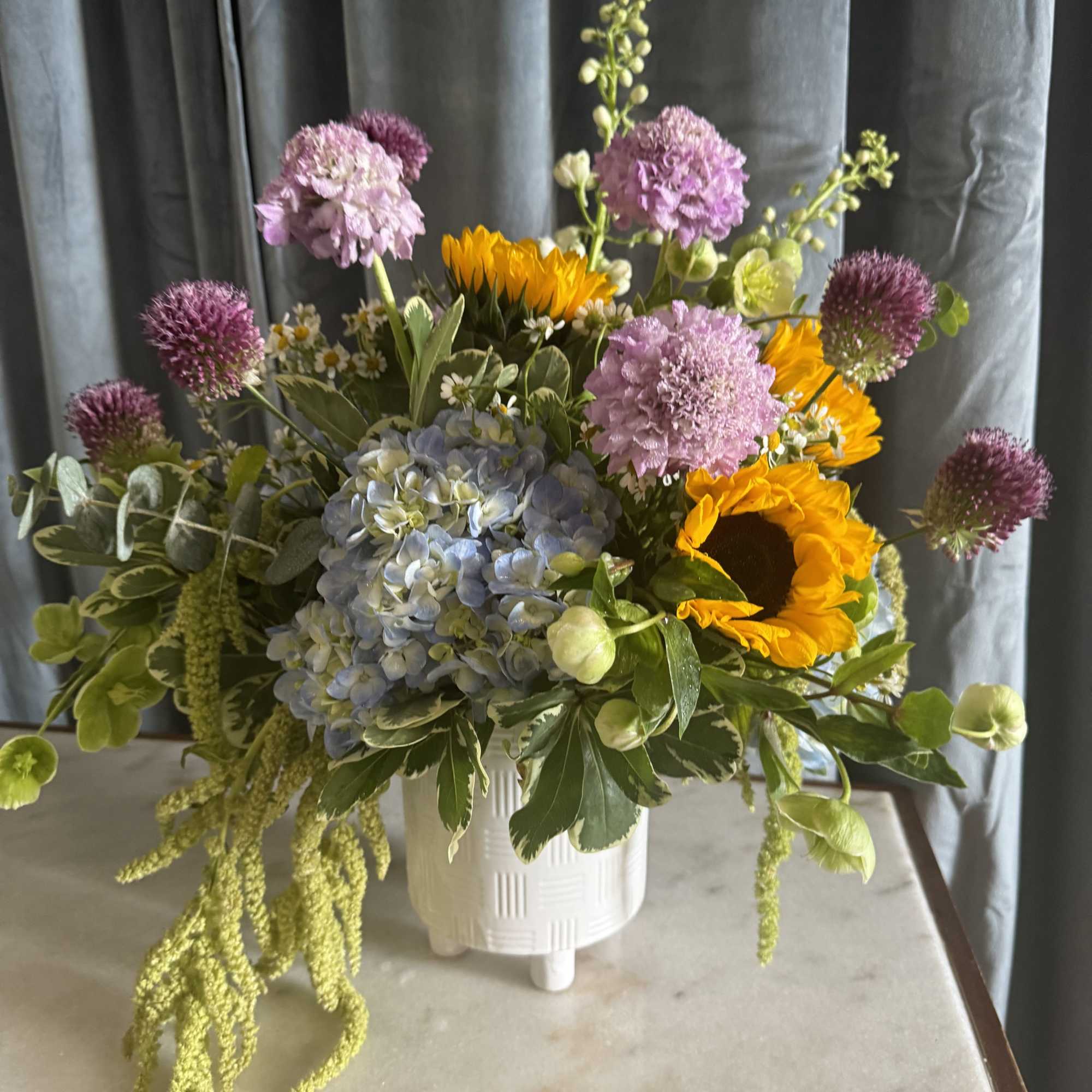 Our talented designers look forward to arranging a stunning floral arrangement using