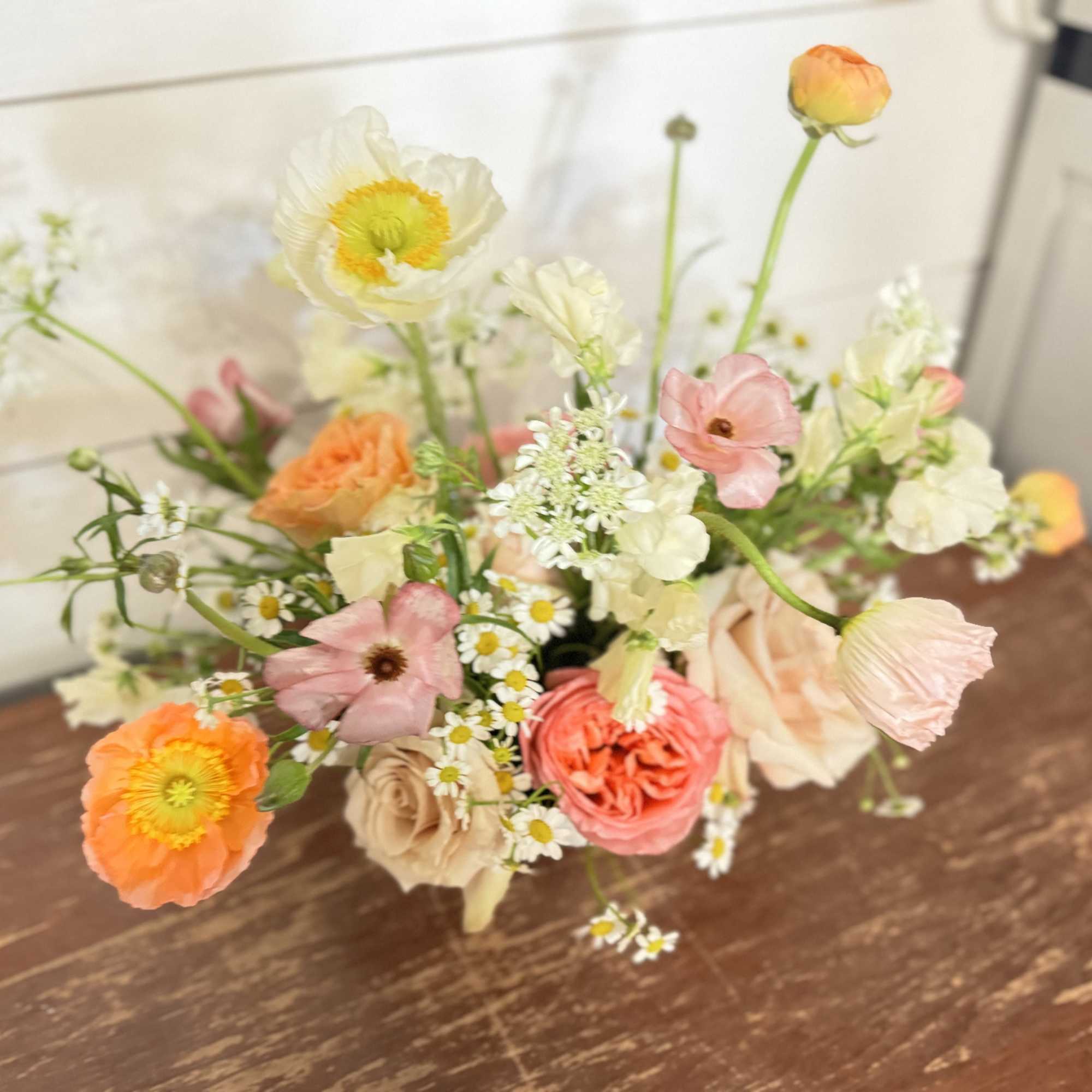 Our talented designers look forward to arranging a stunning floral arrangement using
