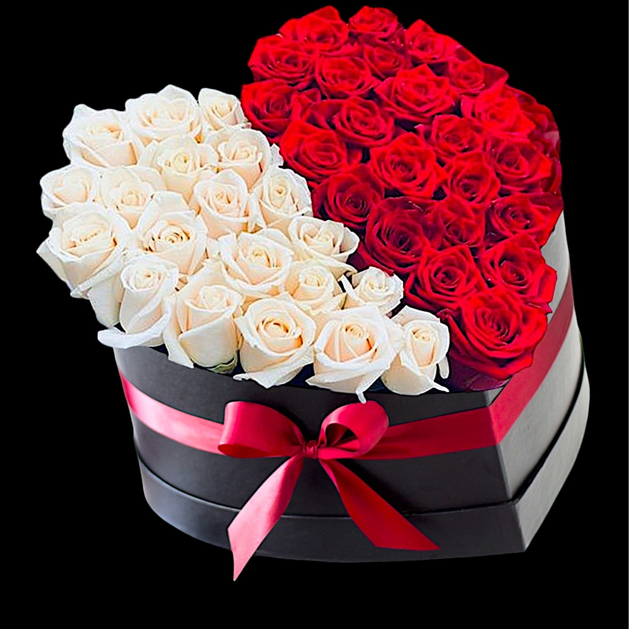 A modern flower arrangement in a heart box filled with roses.

DETAILS
This heart