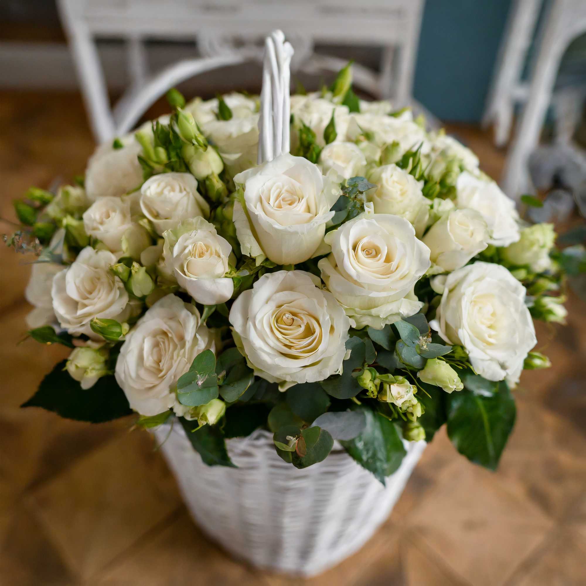 Indulge in the charm of our fresh white roses, nestled within exquisite