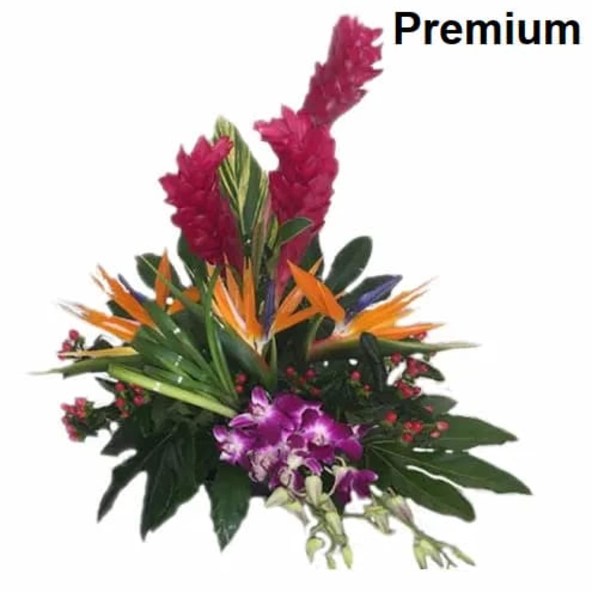 Tropical Flowers as shown arranged in a vase. Deluxe version shows more