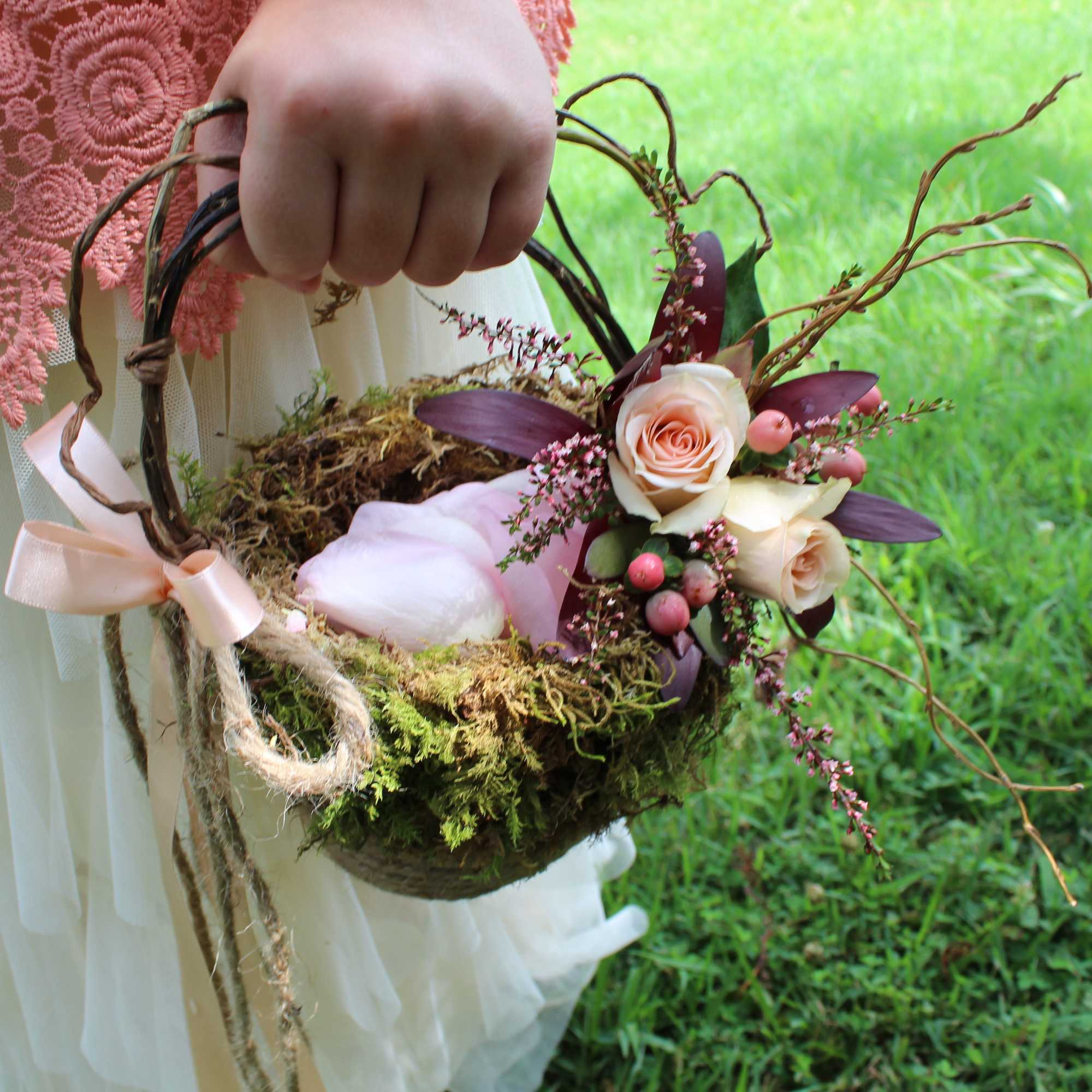Our handcrafted Flower Girl Basket is created using fresh moss and curly Our handcrafted Flower Girl Basket is created using fresh moss and curly