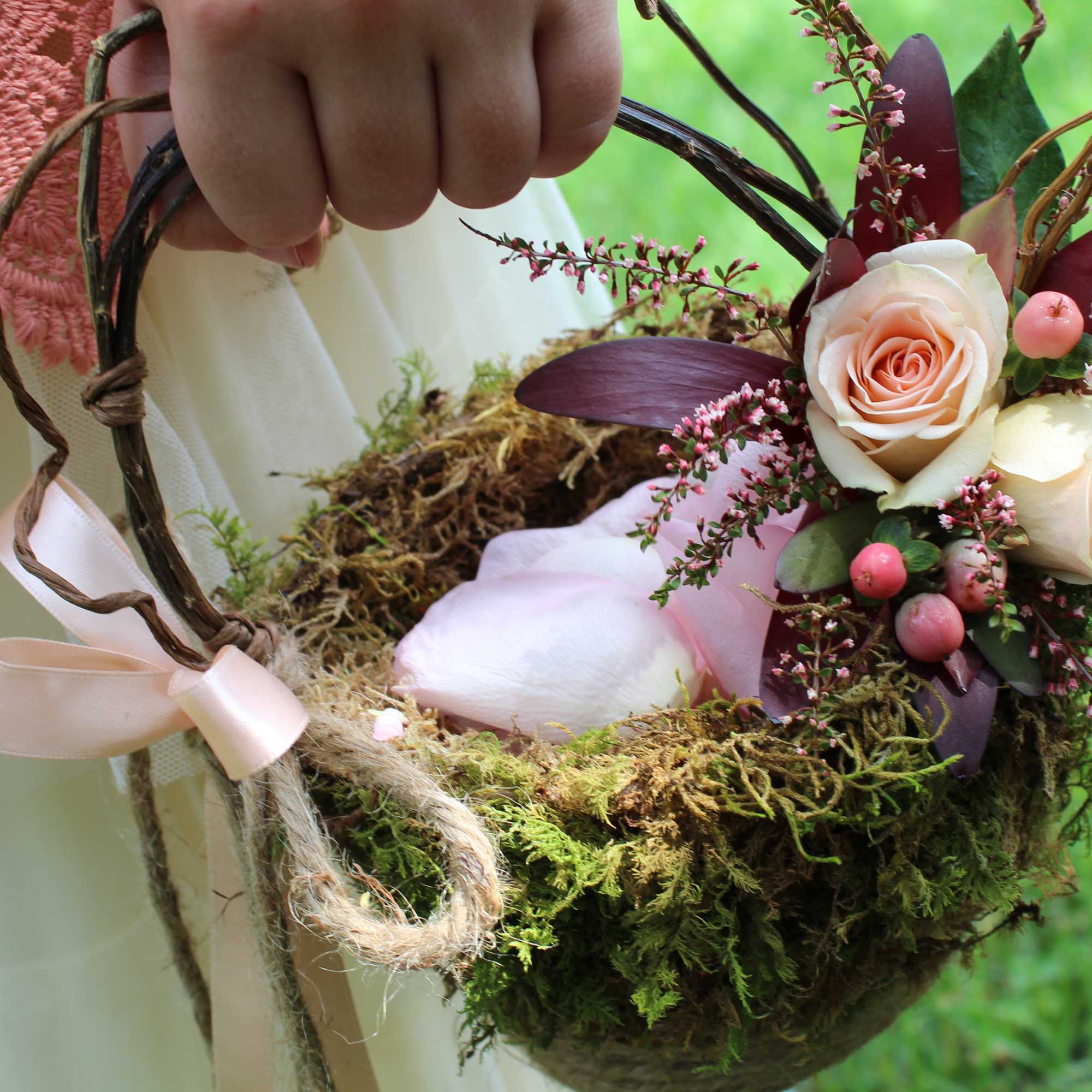 Our handcrafted Flower Girl Basket is created using fresh moss and curly Our handcrafted Flower Girl Basket is created using fresh moss and curly