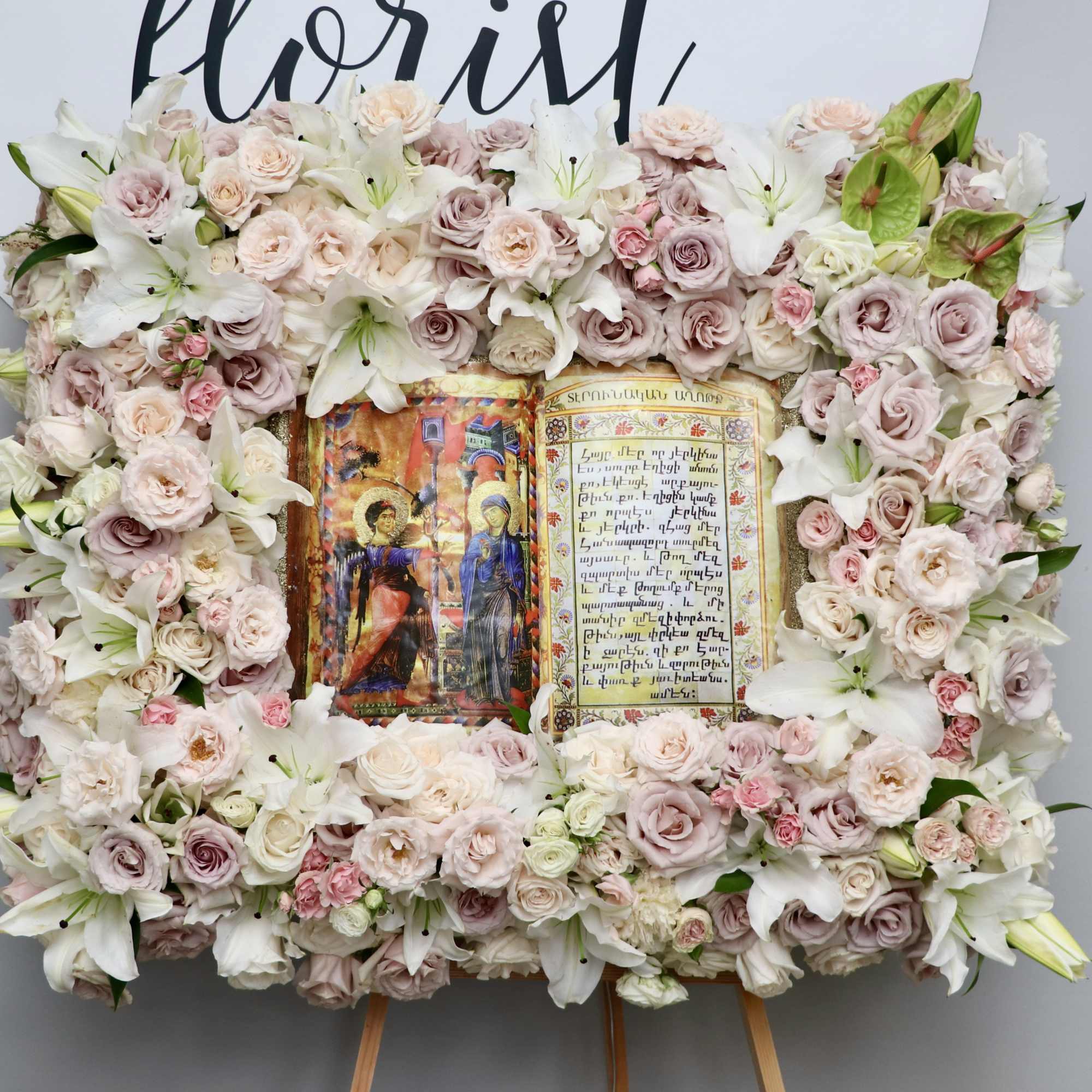 This framed bible page is made with a variety of pink florals