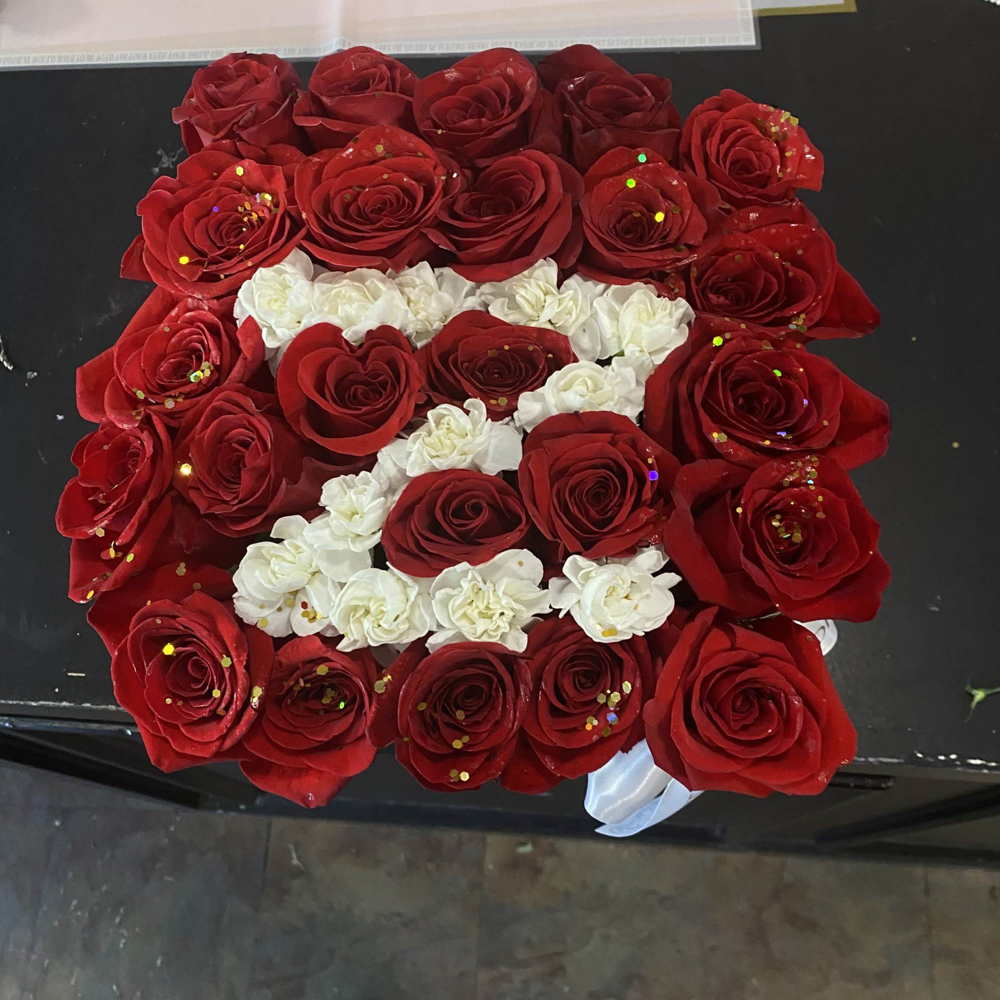 Send a modern version of a &quot;Love Letter&quot;  24 boxed roses