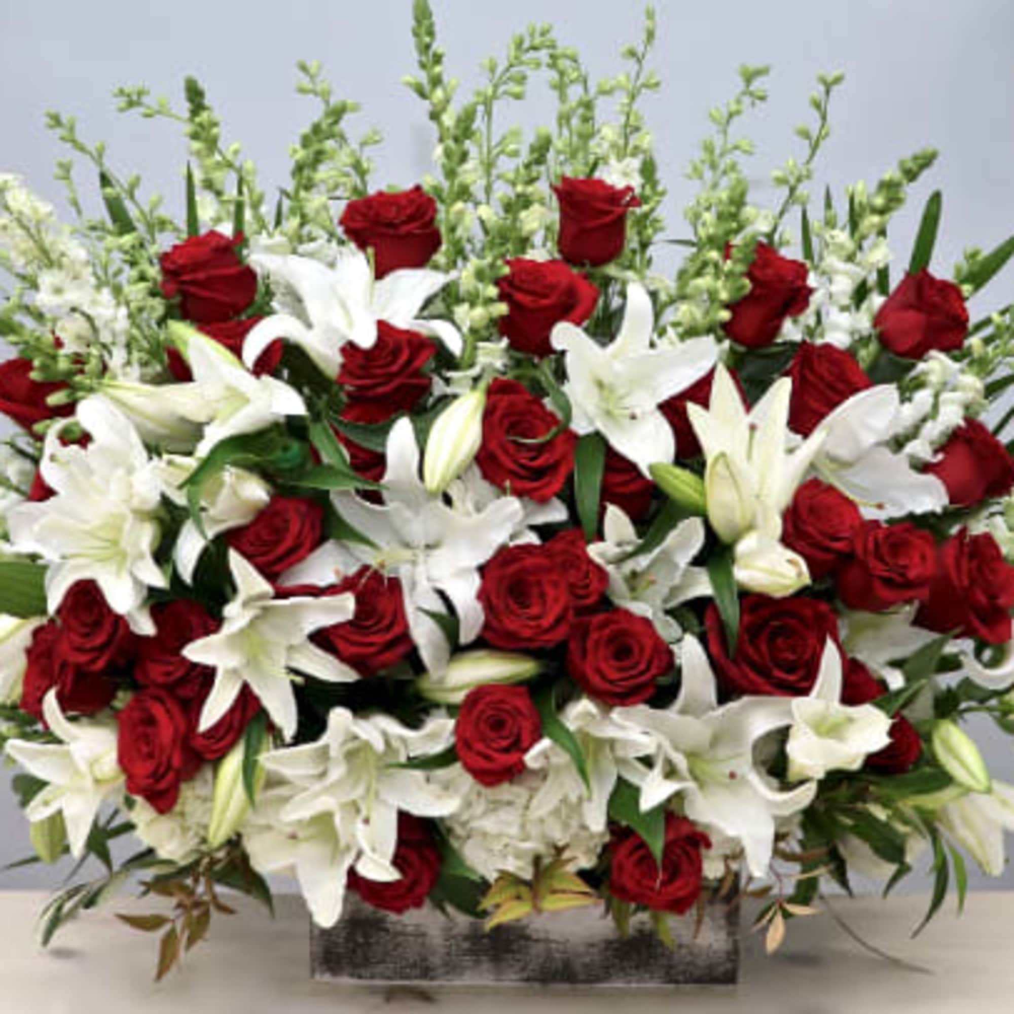 Perfect for any occasion. This arrangement will stand out in any room.
