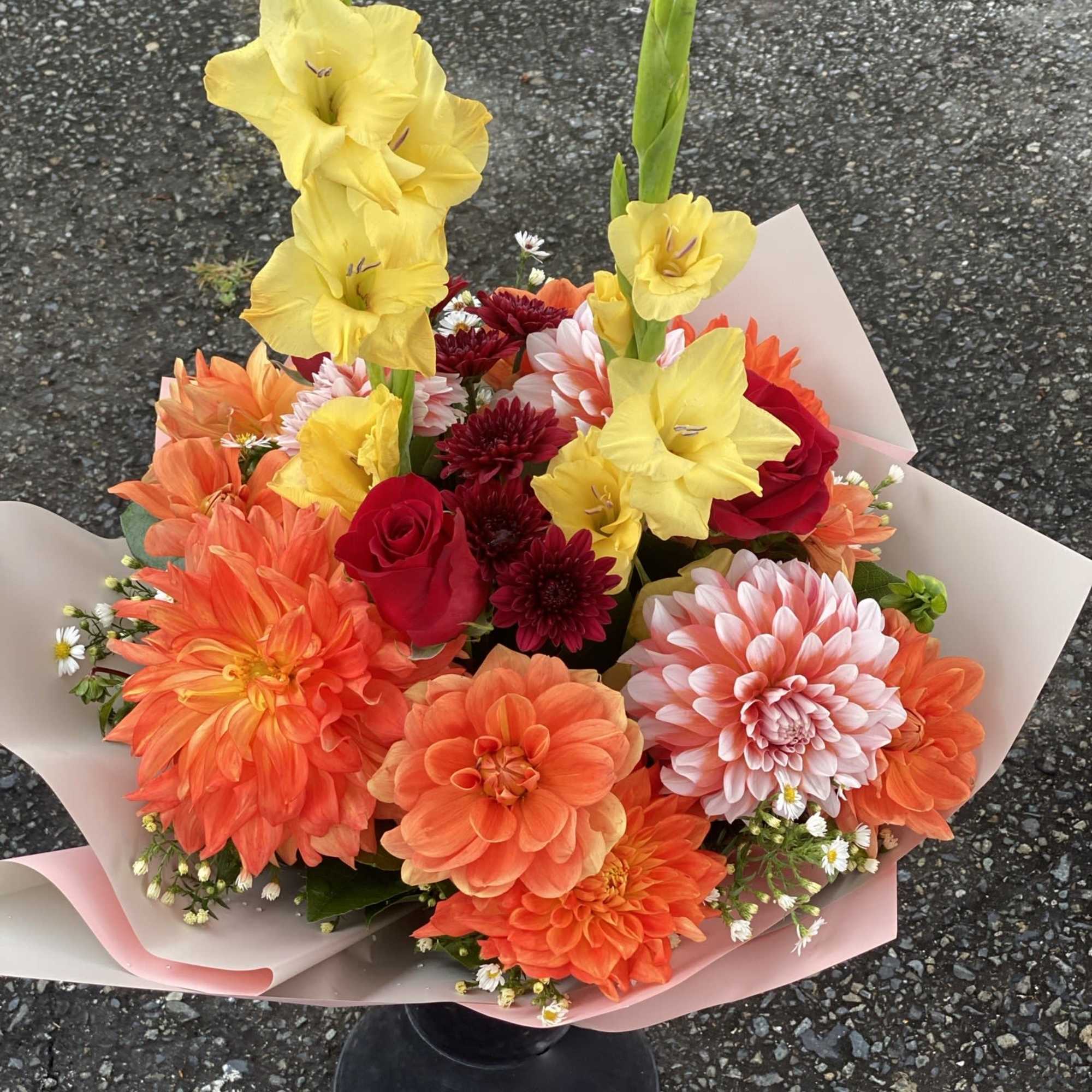 An artistic and bright fall color arrangement is a pleaser and interesting