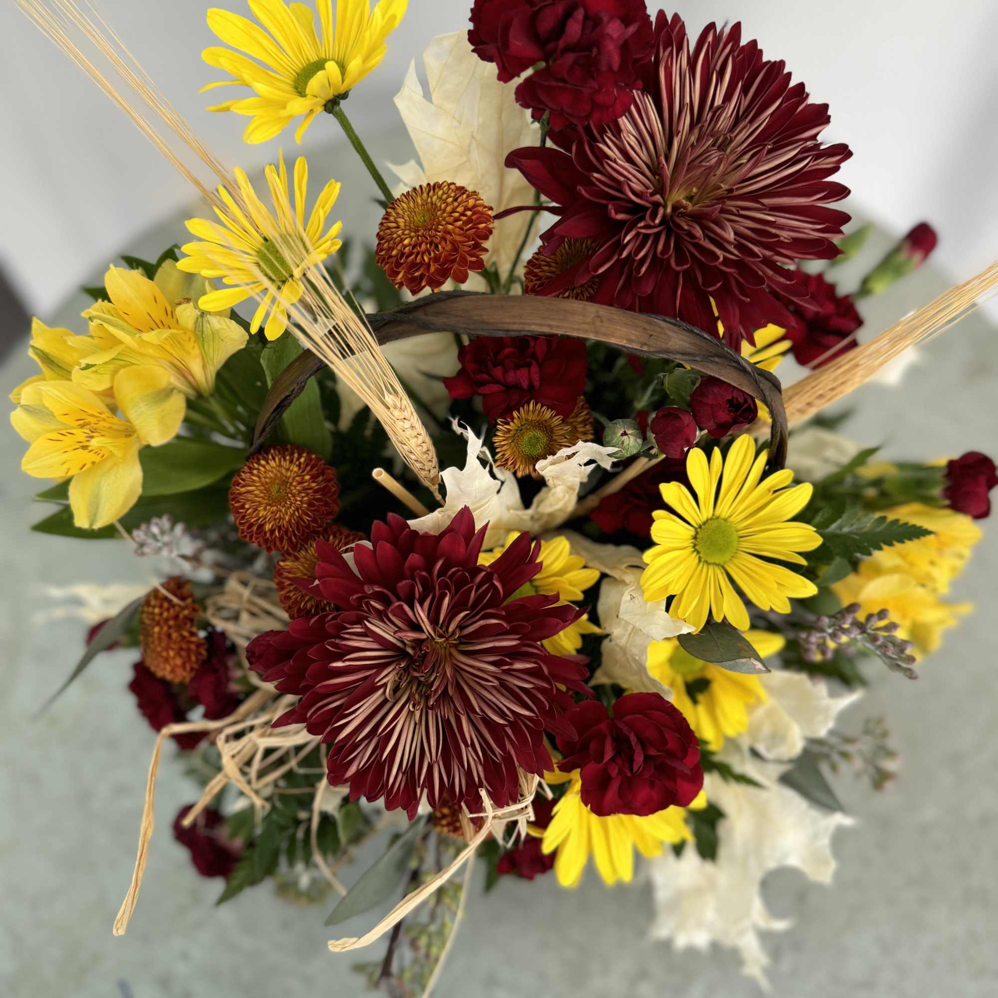 Capture the essence of fall with our &quot;Autumn&rsquo;s Embrace&quot; floral arrangement. Each