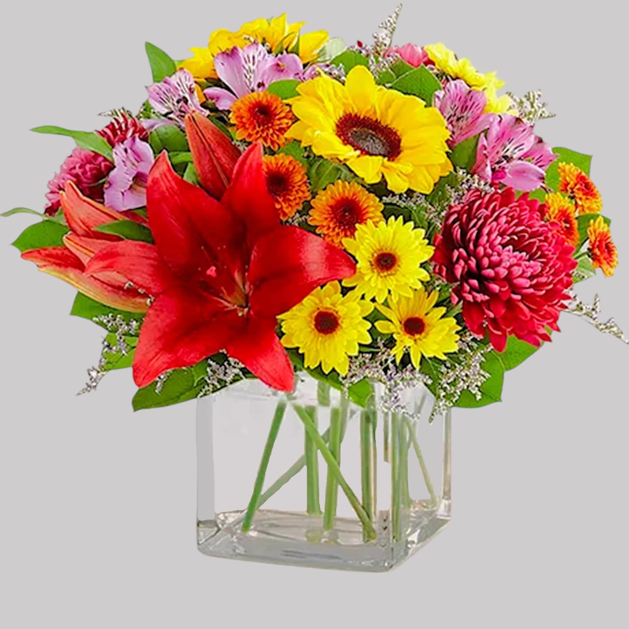 Embrace autumn&rsquo;s allure with our harvest-inspired arrangement. A loose gathering of blooms