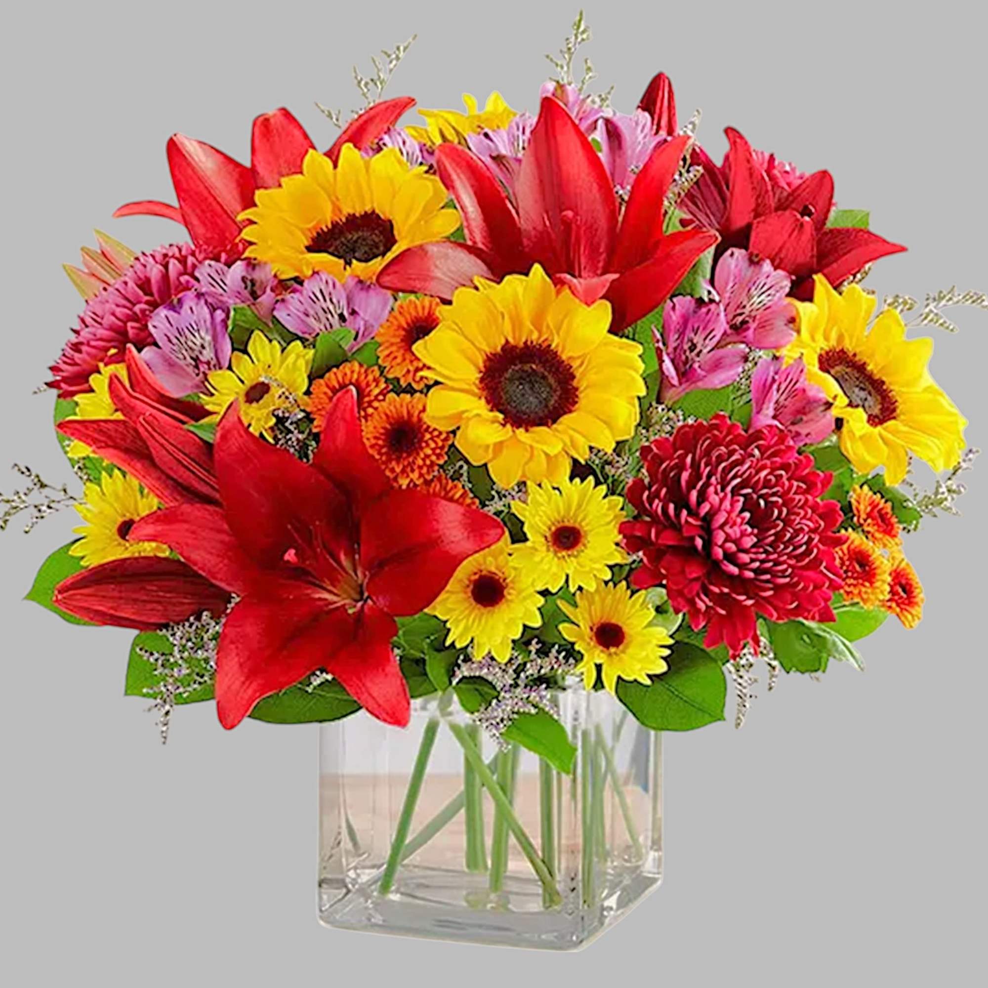 Embrace autumn&rsquo;s allure with our harvest-inspired arrangement. A loose gathering of blooms