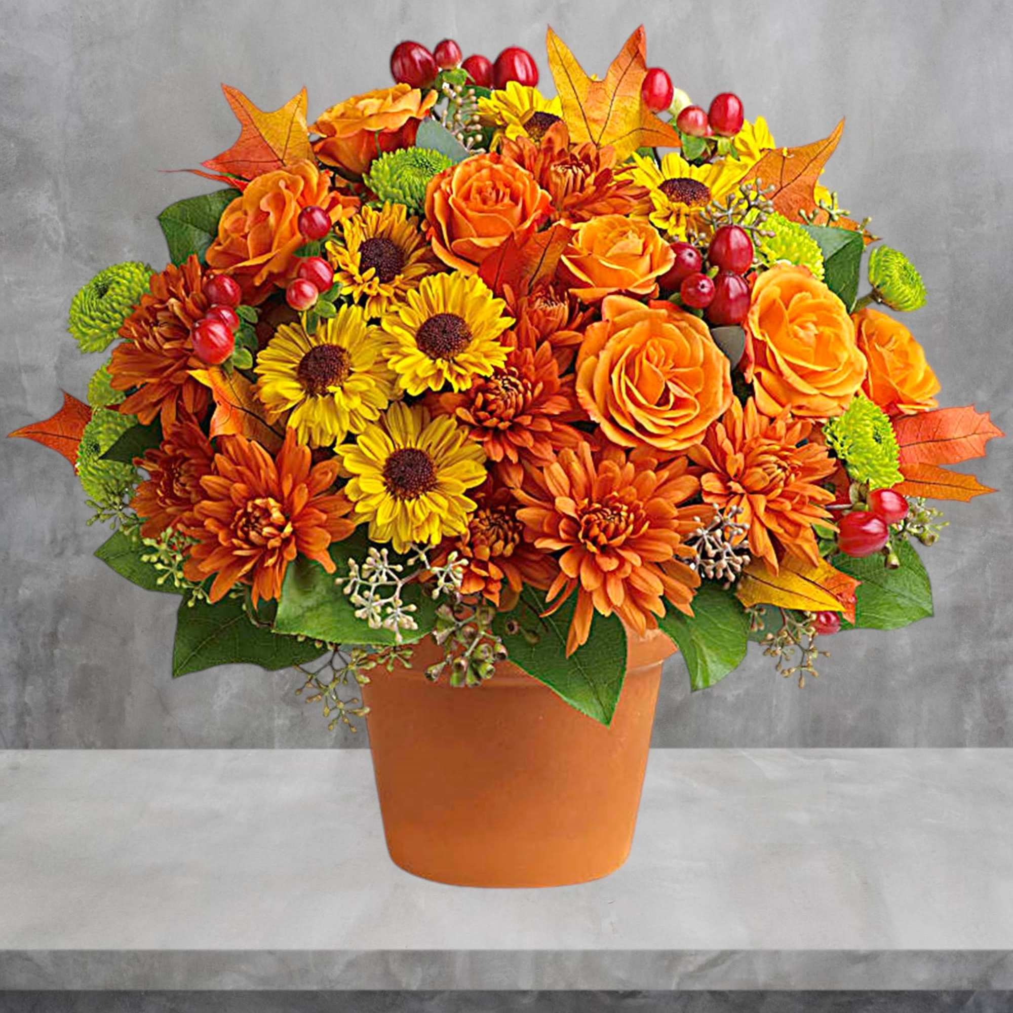 Autumnal colors are nestled together with brilliant fall leaves to create a