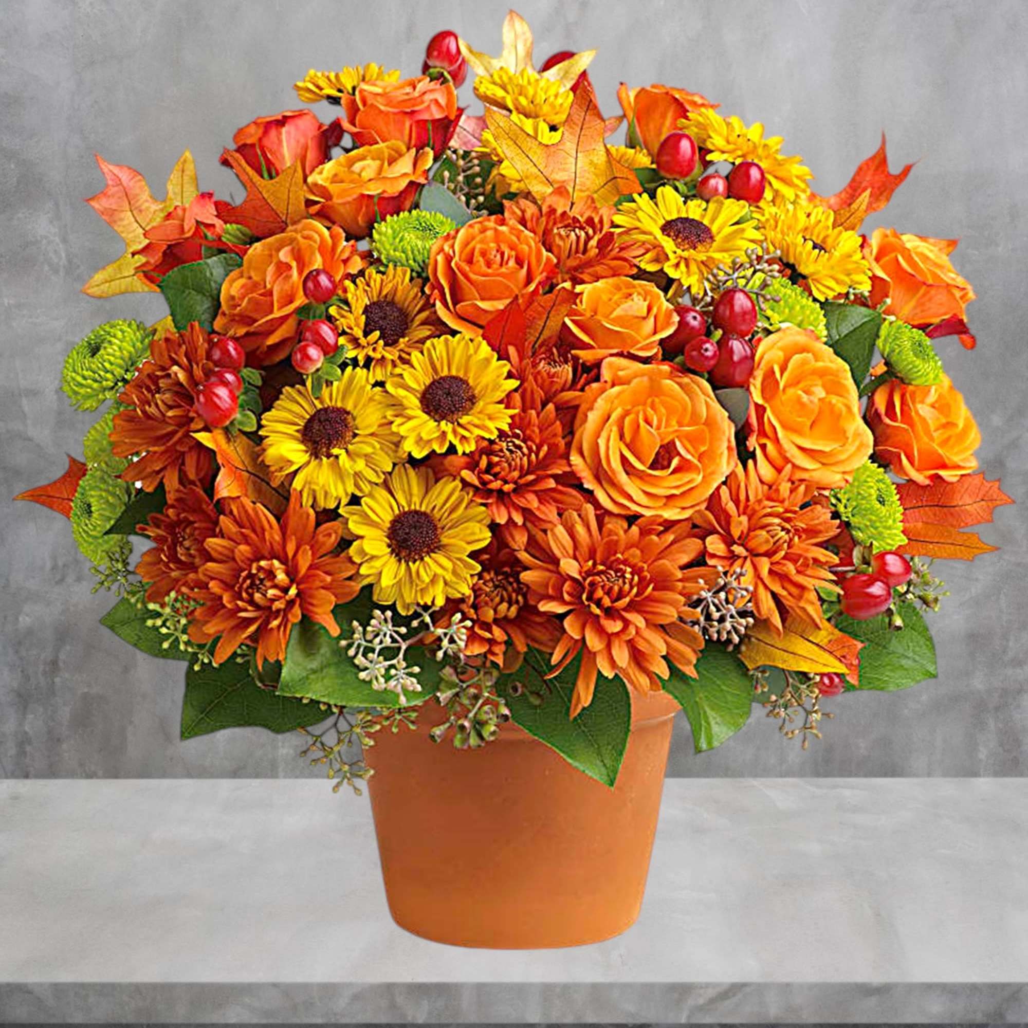 Autumnal colors are nestled together with brilliant fall leaves to create a