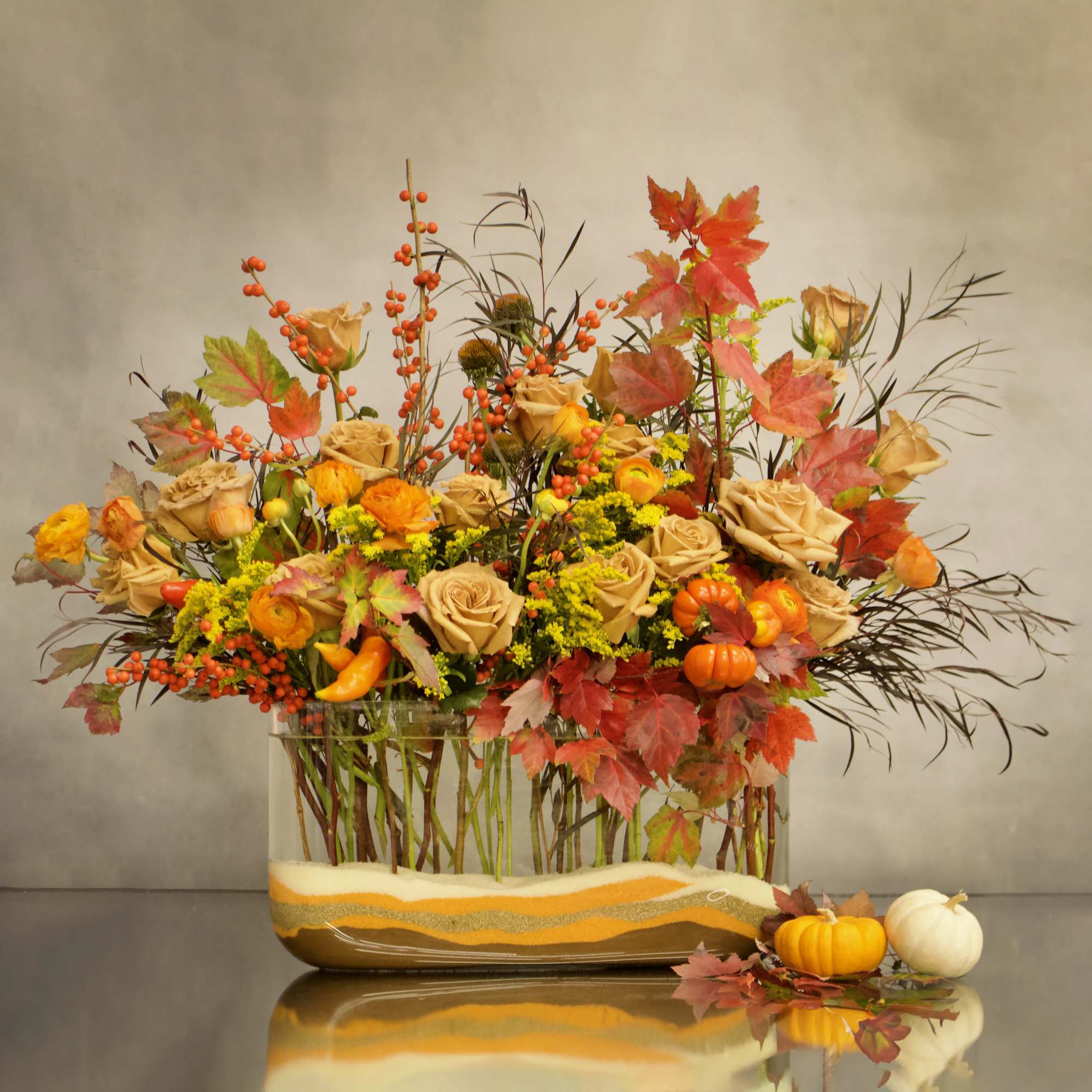 This fun fall arrangement really lights up in any room. This is