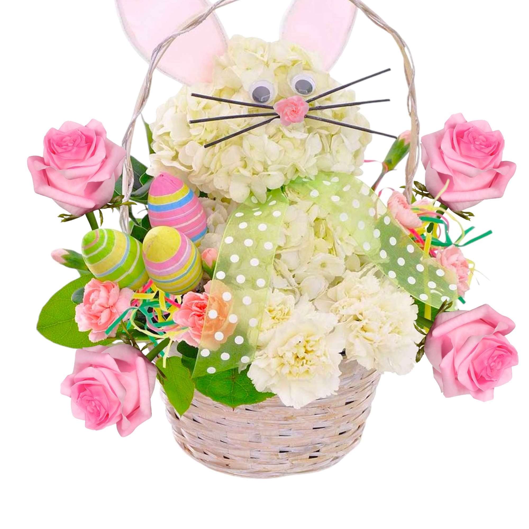 This Easter Bunny arrangement with colorful decorative eggs. Easter Bunny is wearing