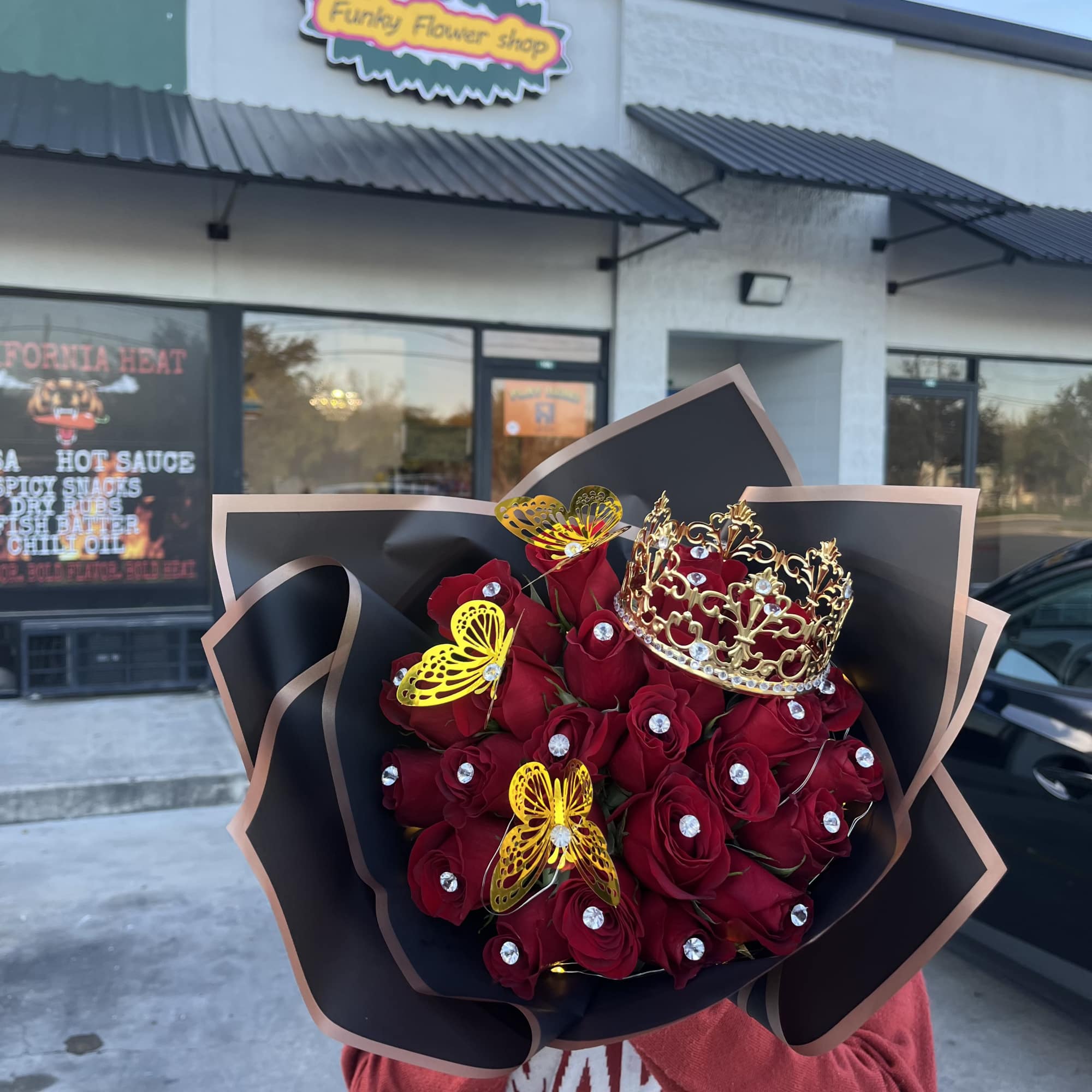 25 long stemmed roses, with a gem pin in each rose, led