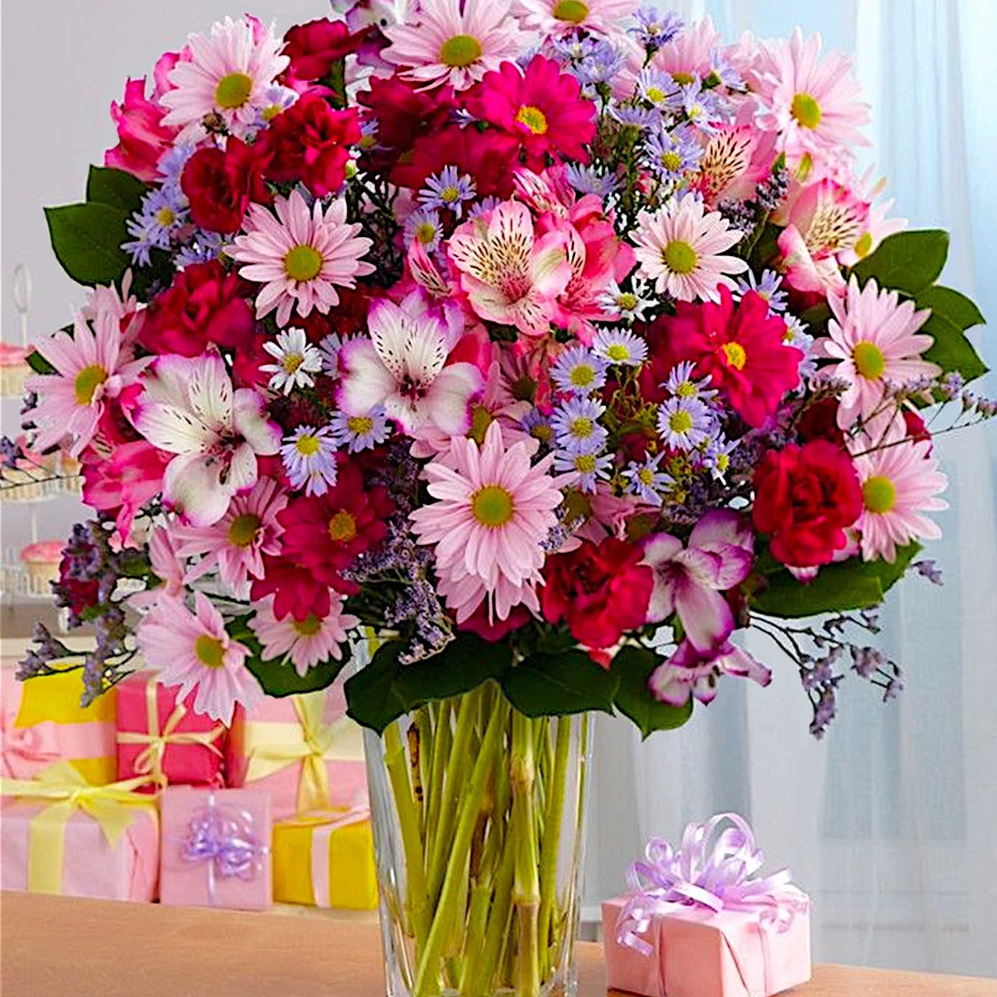 The perfect pick for a cheerful celebration! This cheerful blooms arrangement will