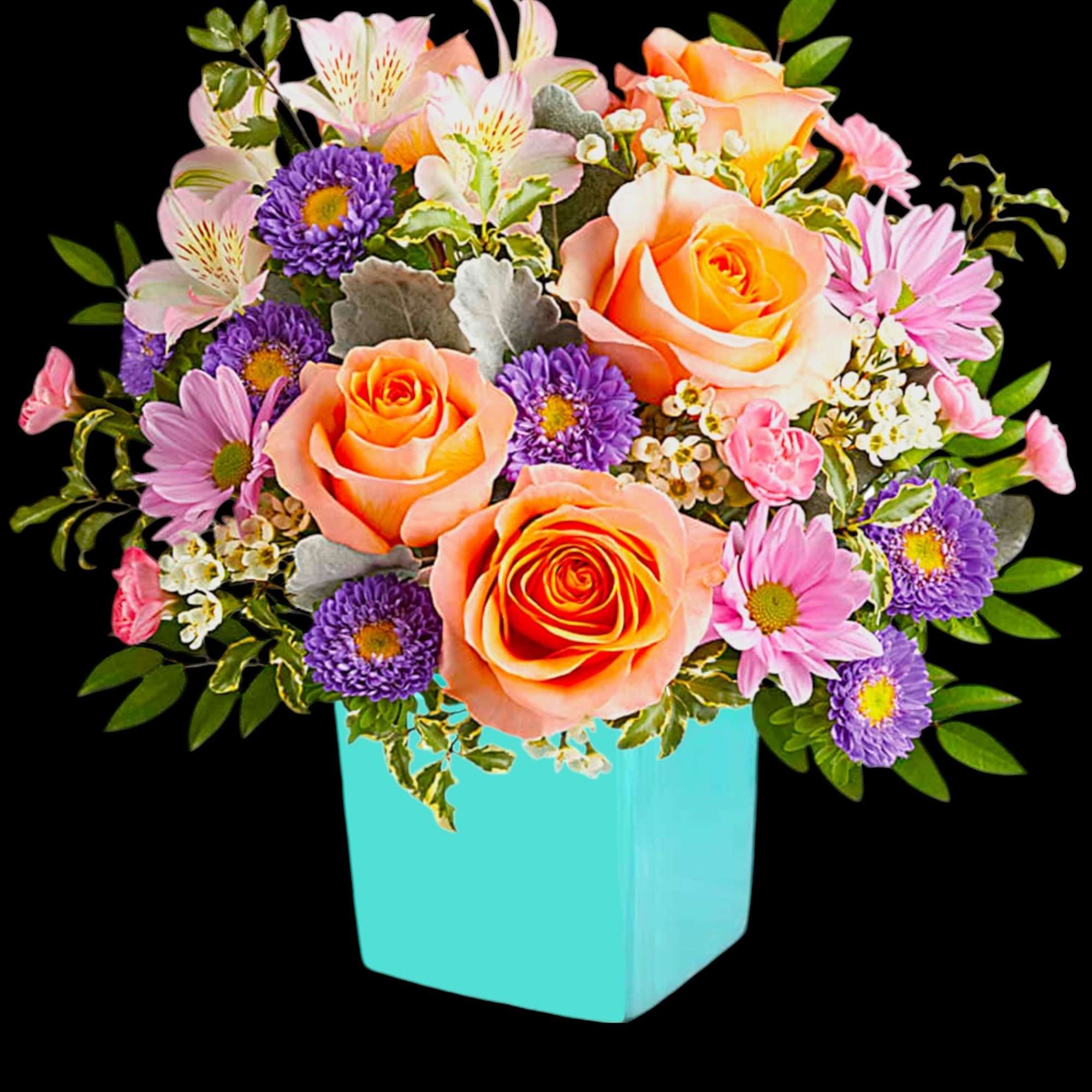 This floral arrangement features the sweetest shades of spring in one whimsical