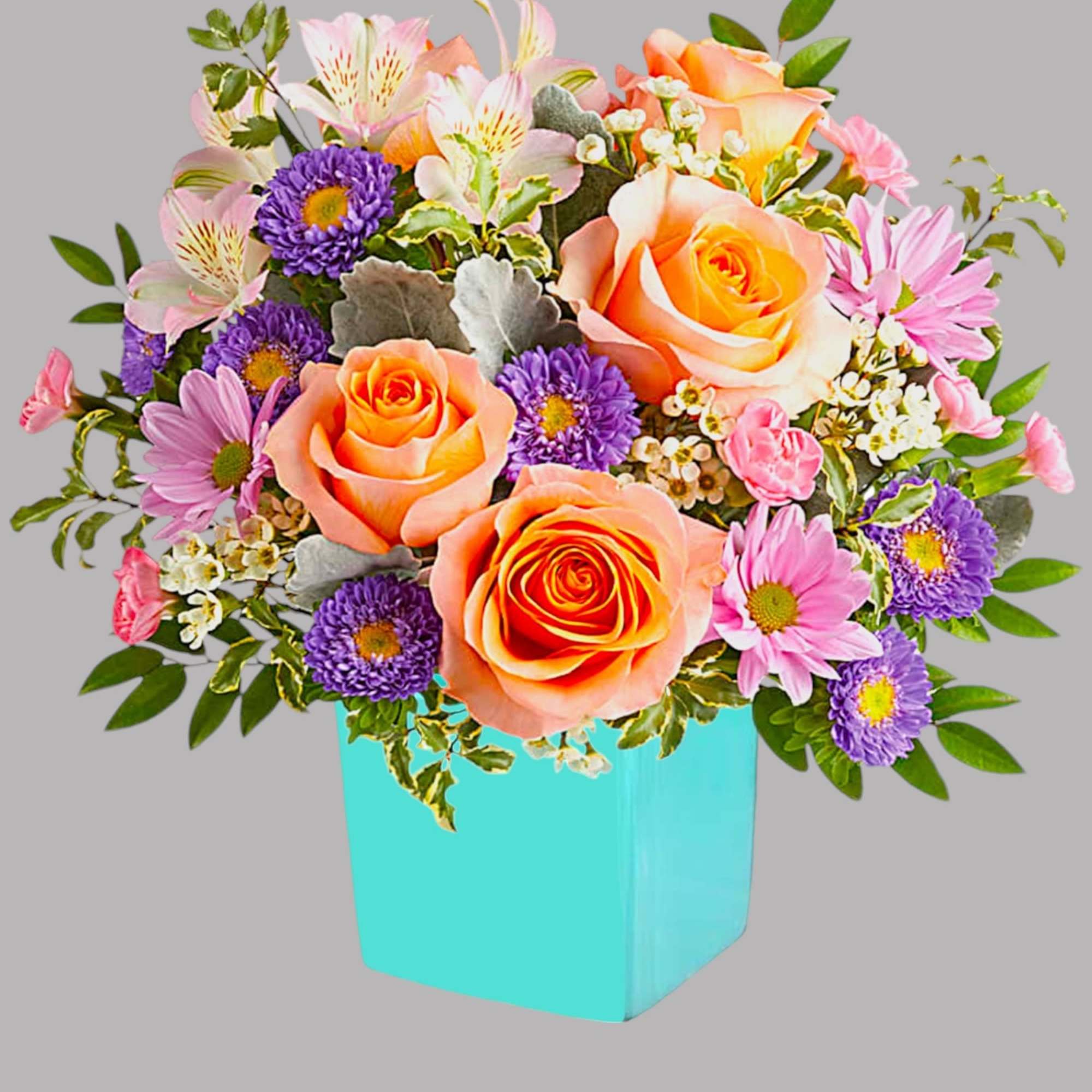 This floral arrangement features the sweetest shades of spring in one whimsical