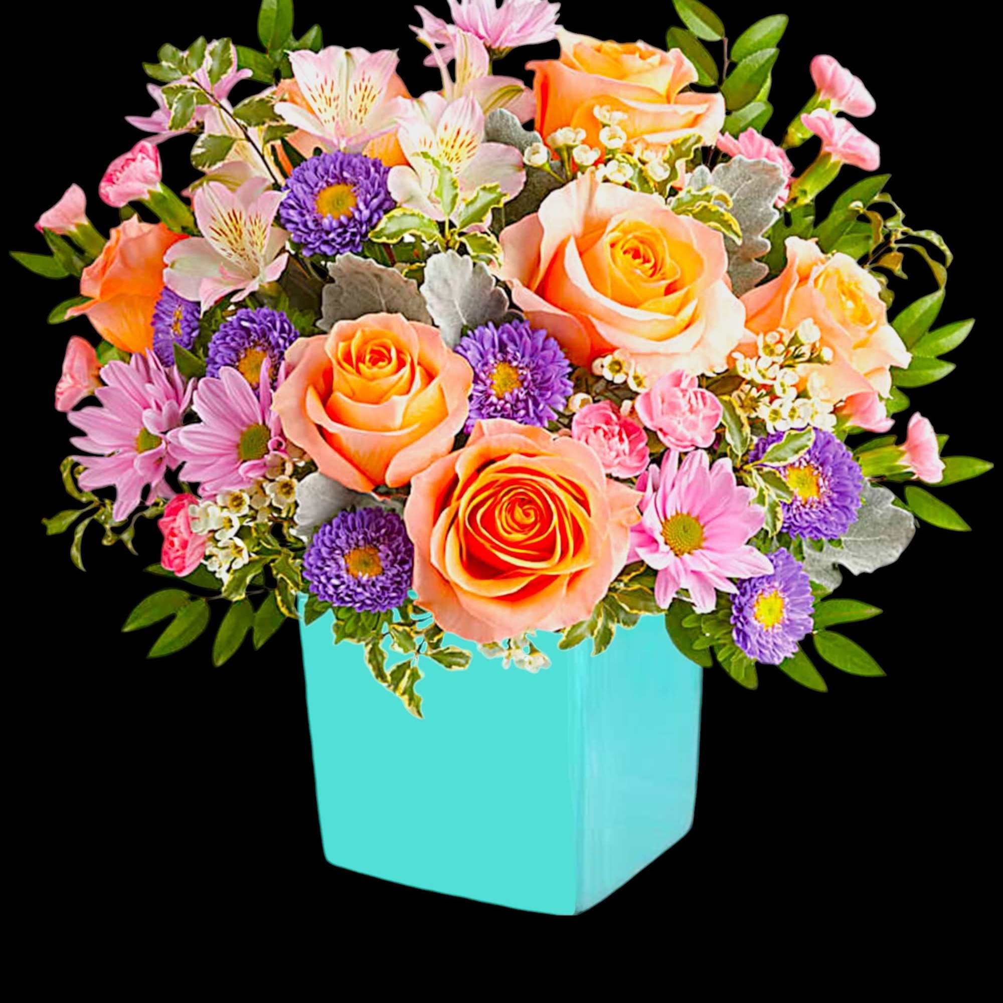 This floral arrangement features the sweetest shades of spring in one whimsical