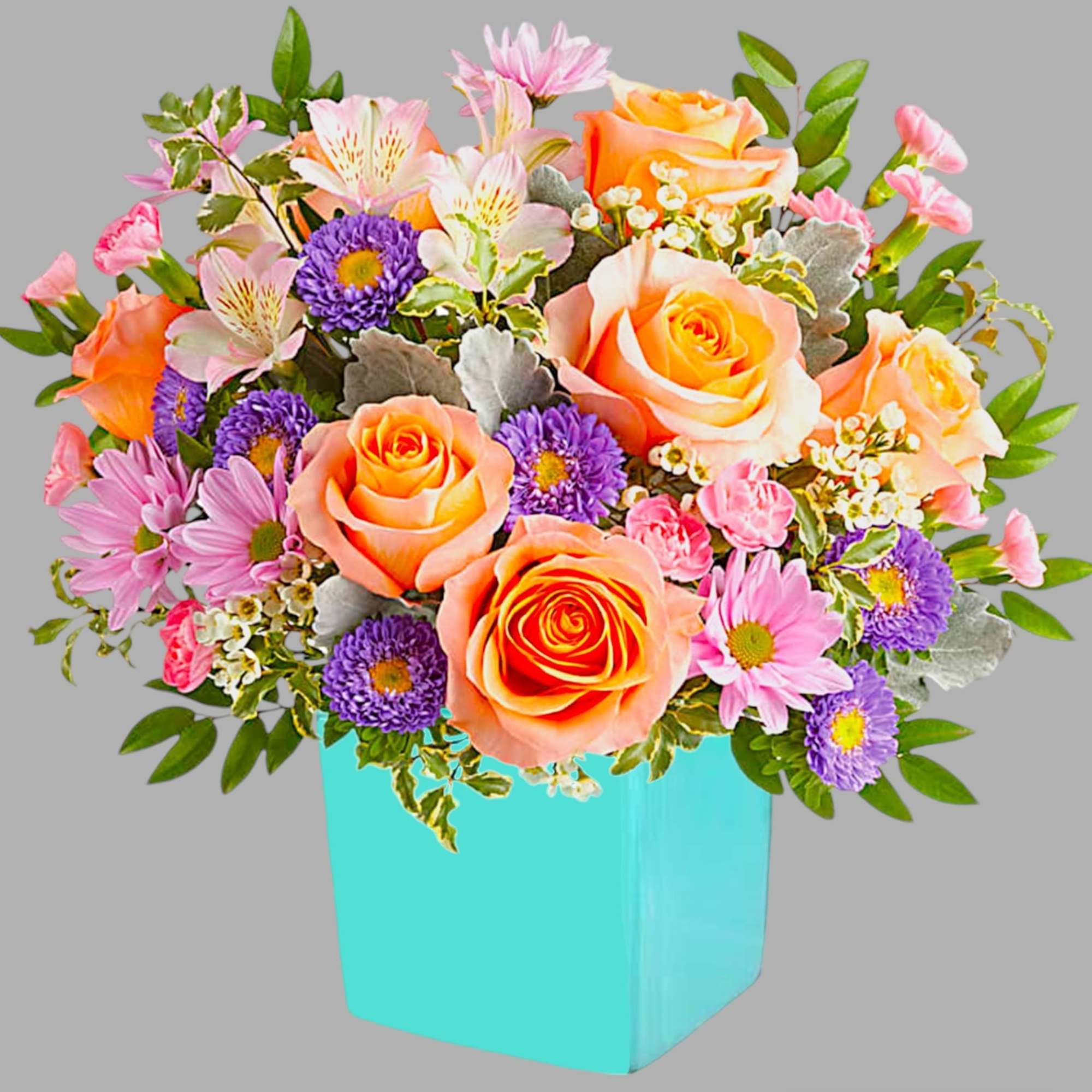 This floral arrangement features the sweetest shades of spring in one whimsical