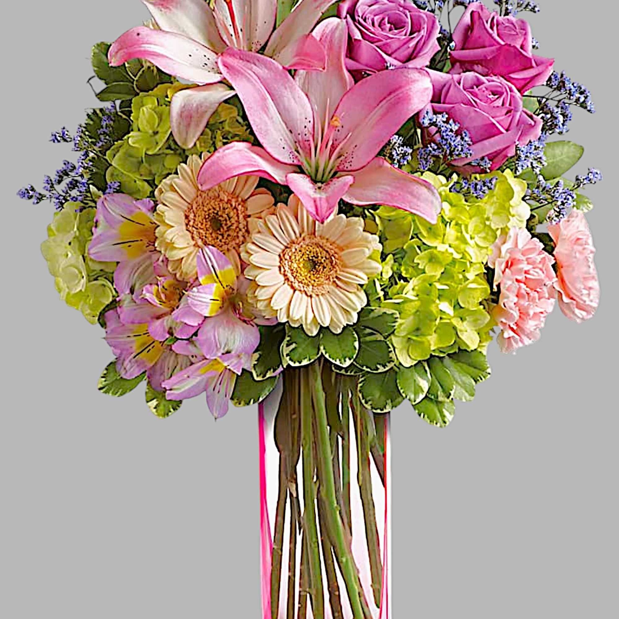 A lovely surprise no matter the occasion, this gorgeous blend of hydrangea