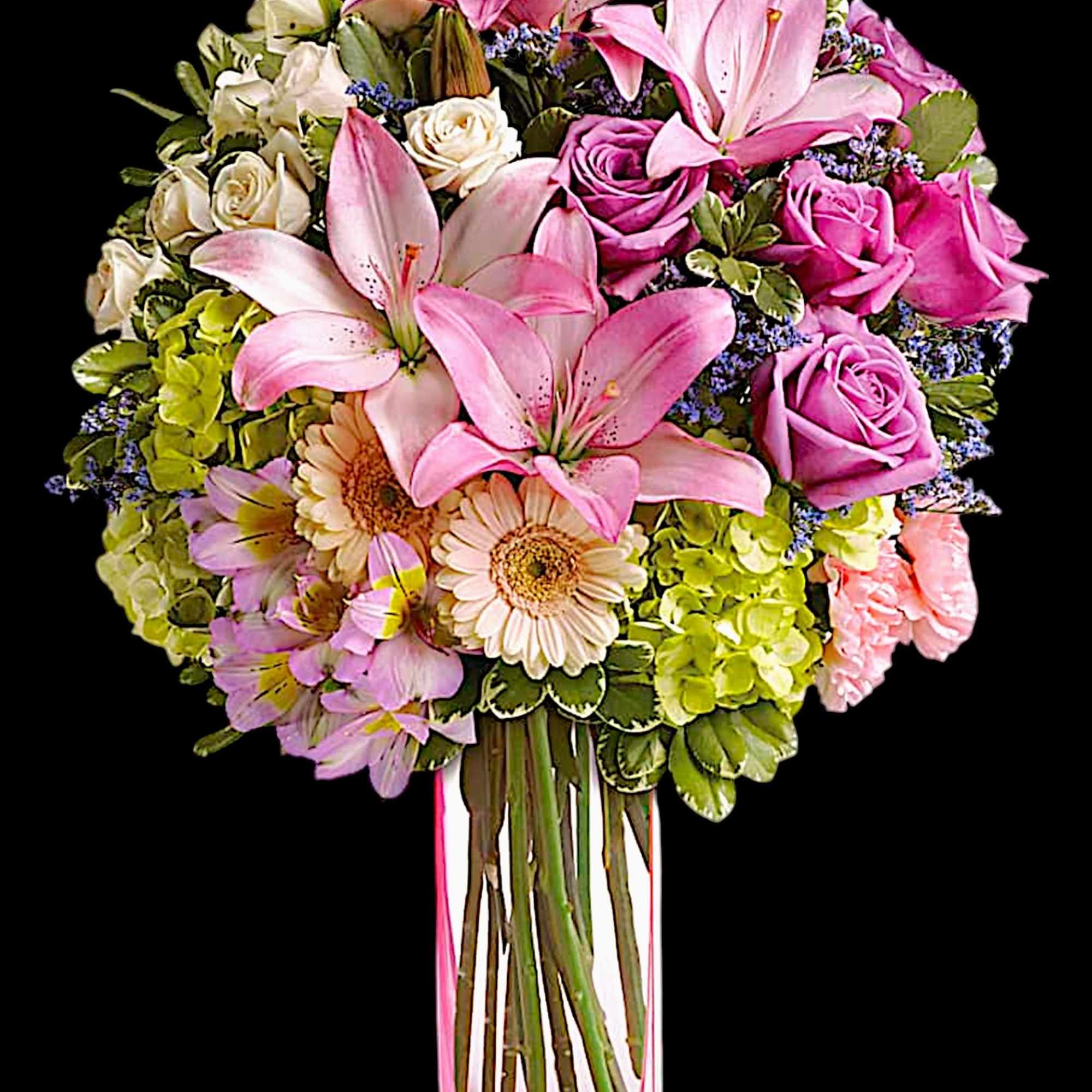 A lovely surprise no matter the occasion, this gorgeous blend of hydrangea