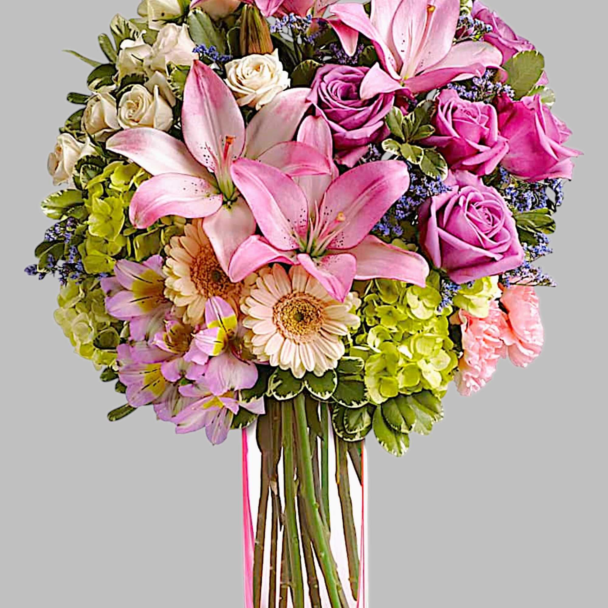 A lovely surprise no matter the occasion, this gorgeous blend of hydrangea