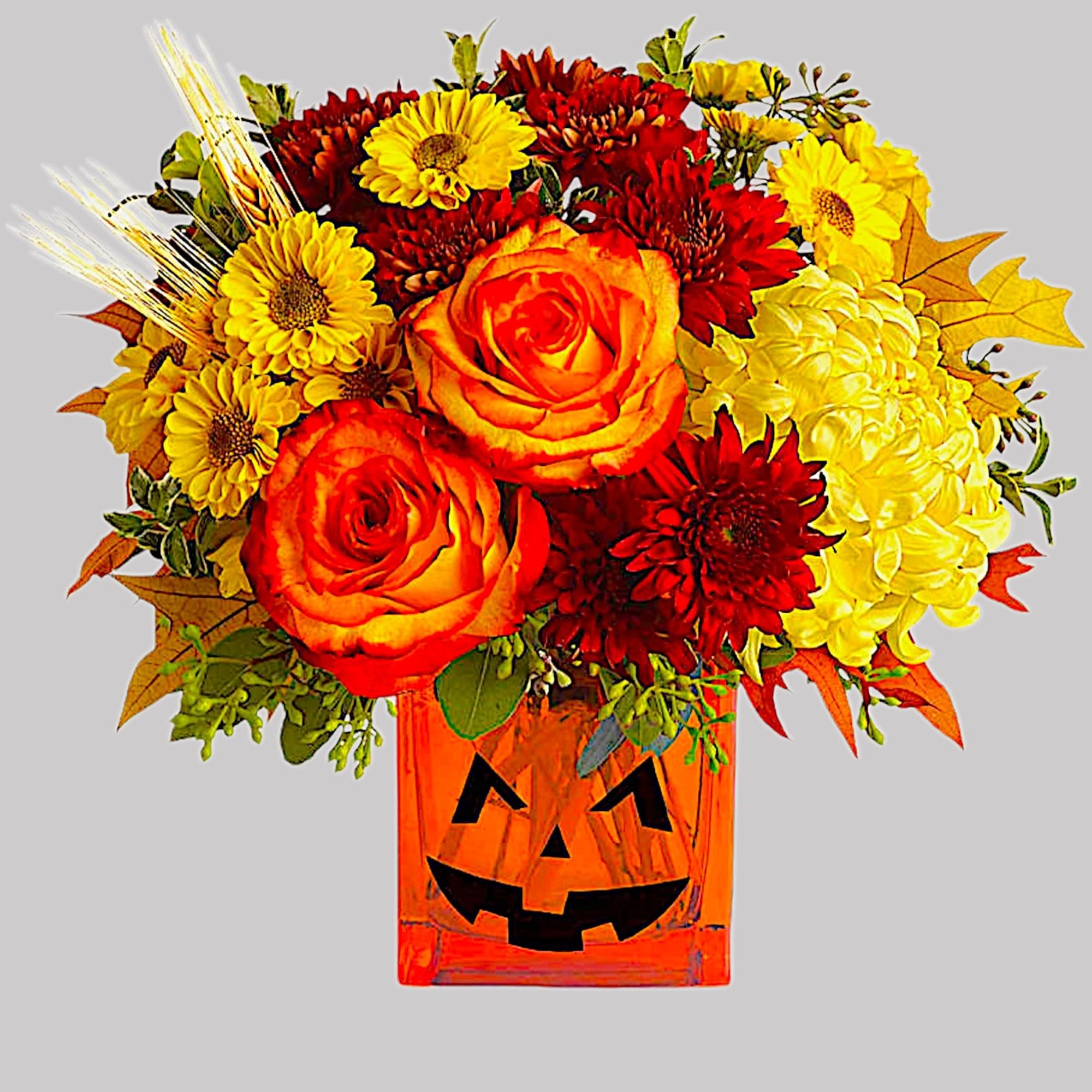 Happy Yellow-een! Yellow chrysanthemums are accented with bright orange roses -all finished