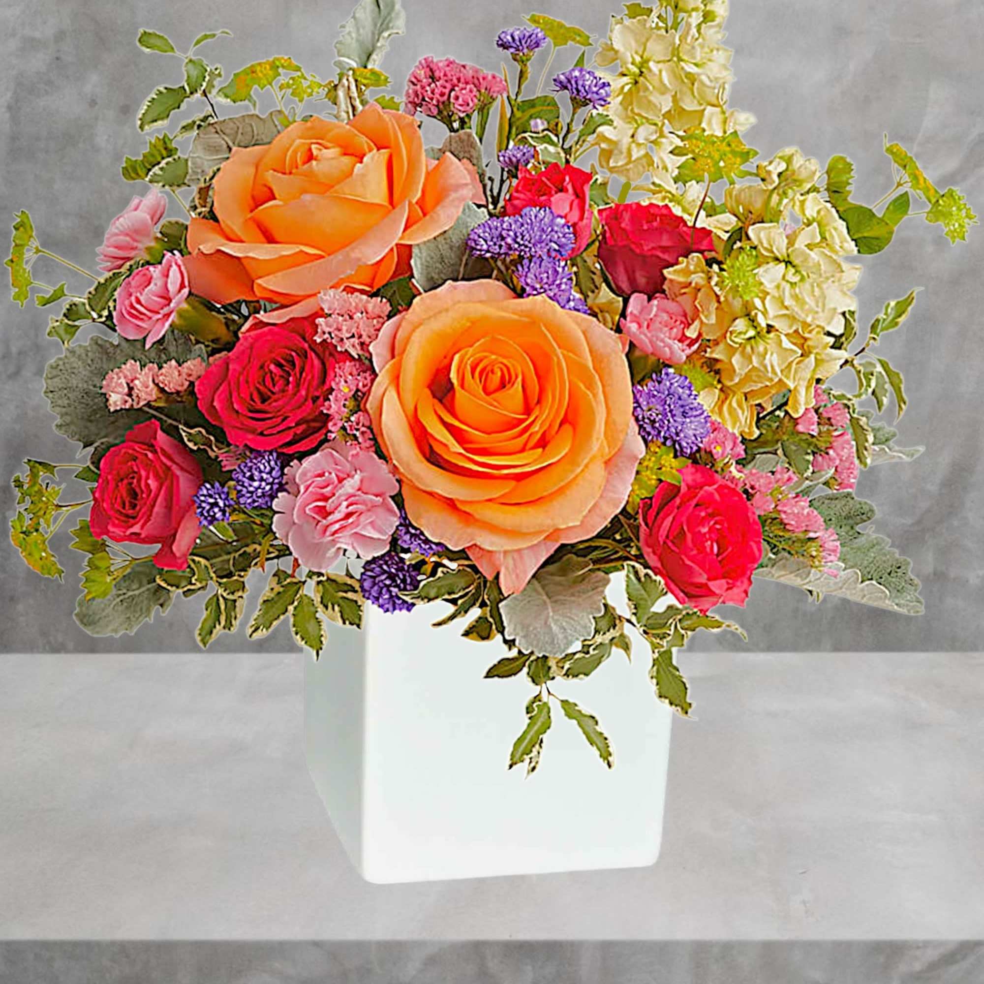 Pour on the sunshine! Filled with radiant roses, this cheerful bright arrangement