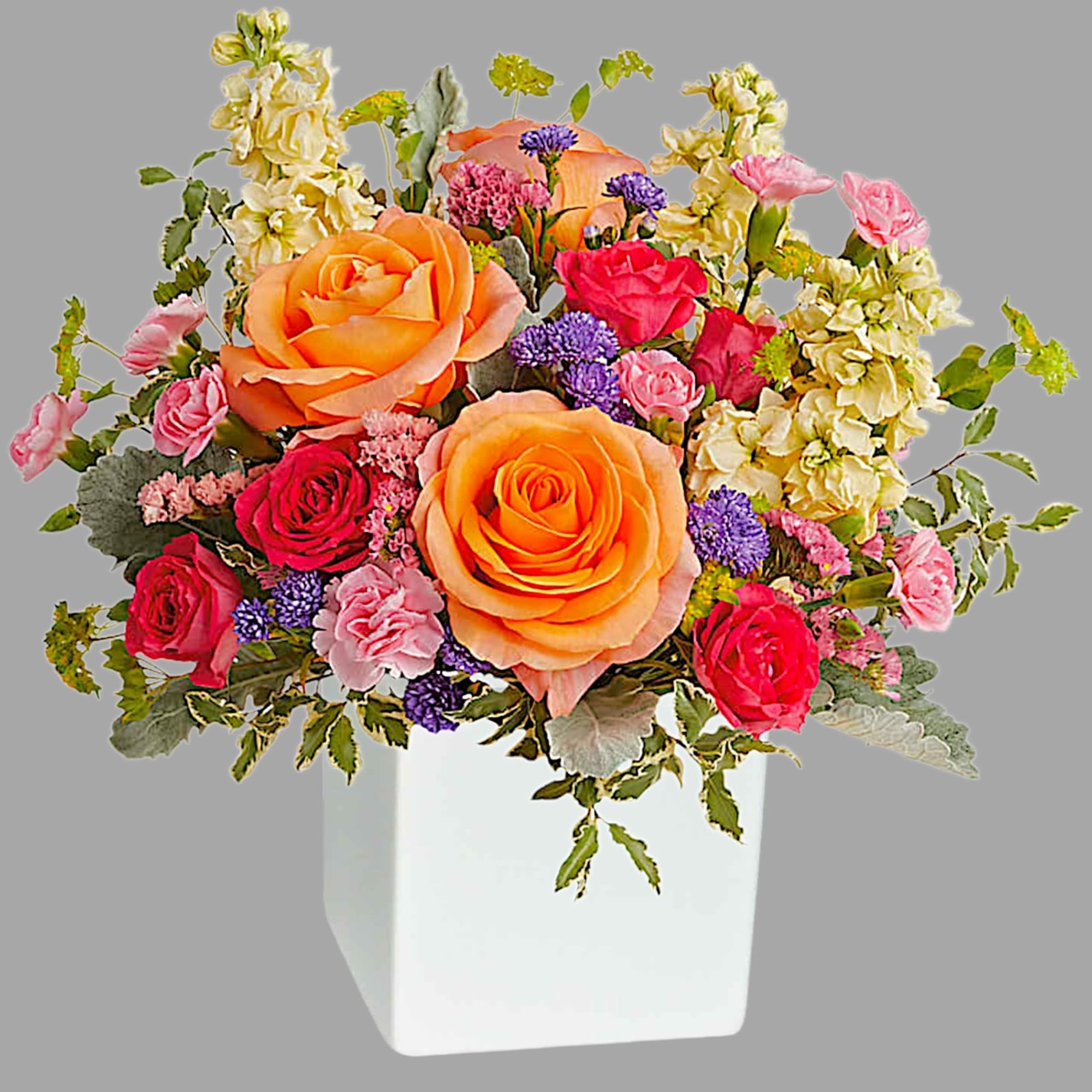 Pour on the sunshine! Filled with radiant roses, this cheerful bright arrangement
