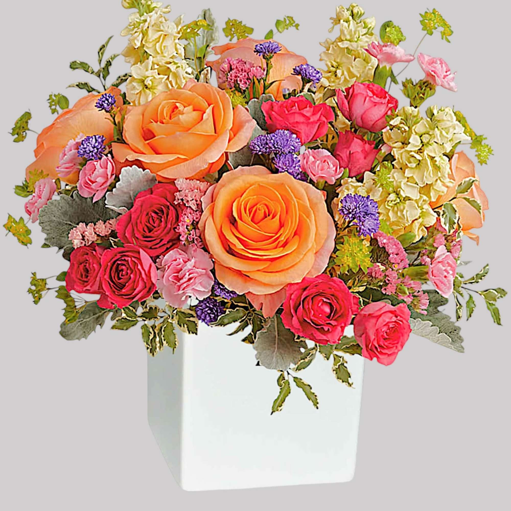 Pour on the sunshine! Filled with radiant roses, this cheerful bright arrangement