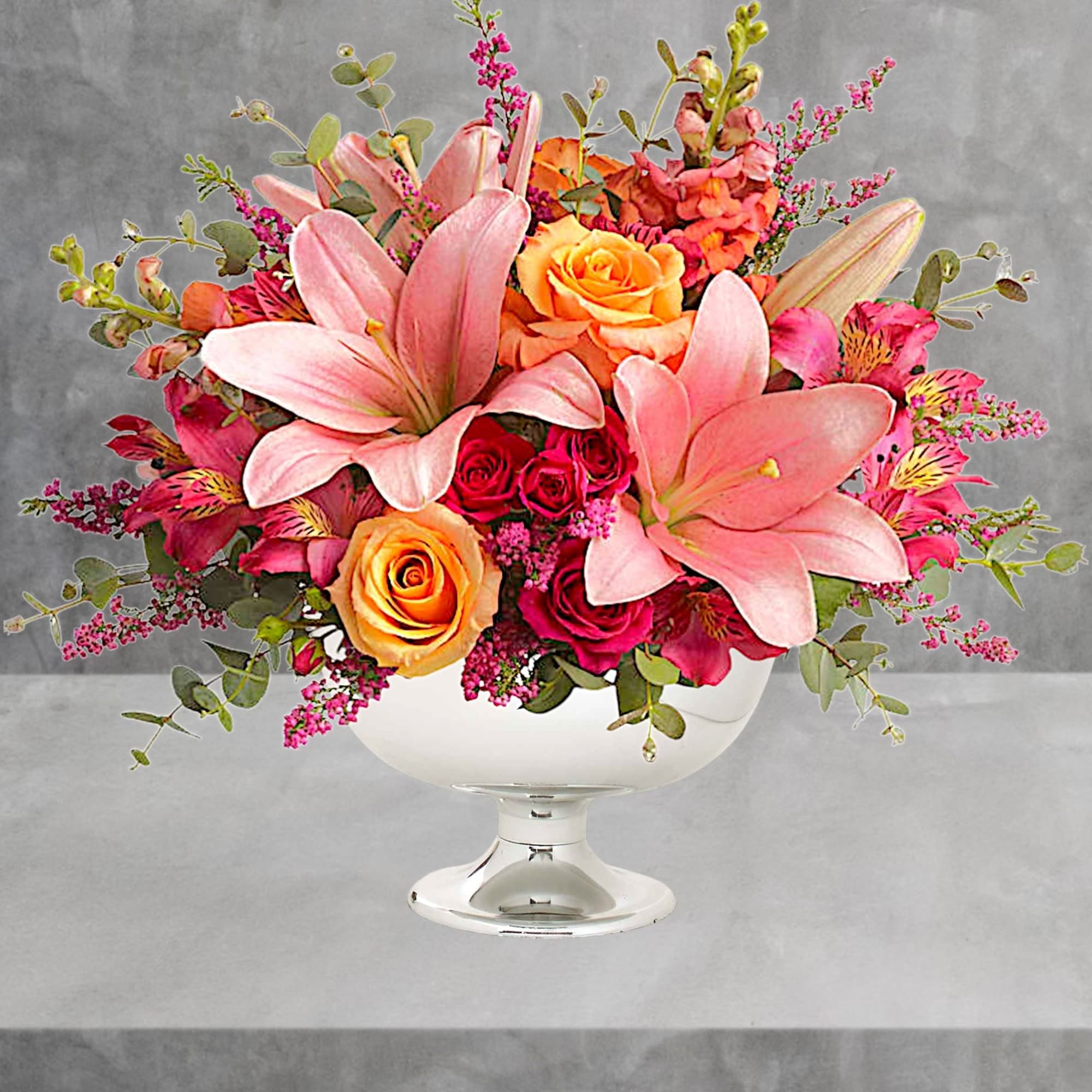 Just peachy! Pale pink &amp; orange blooms are gathered in a silver