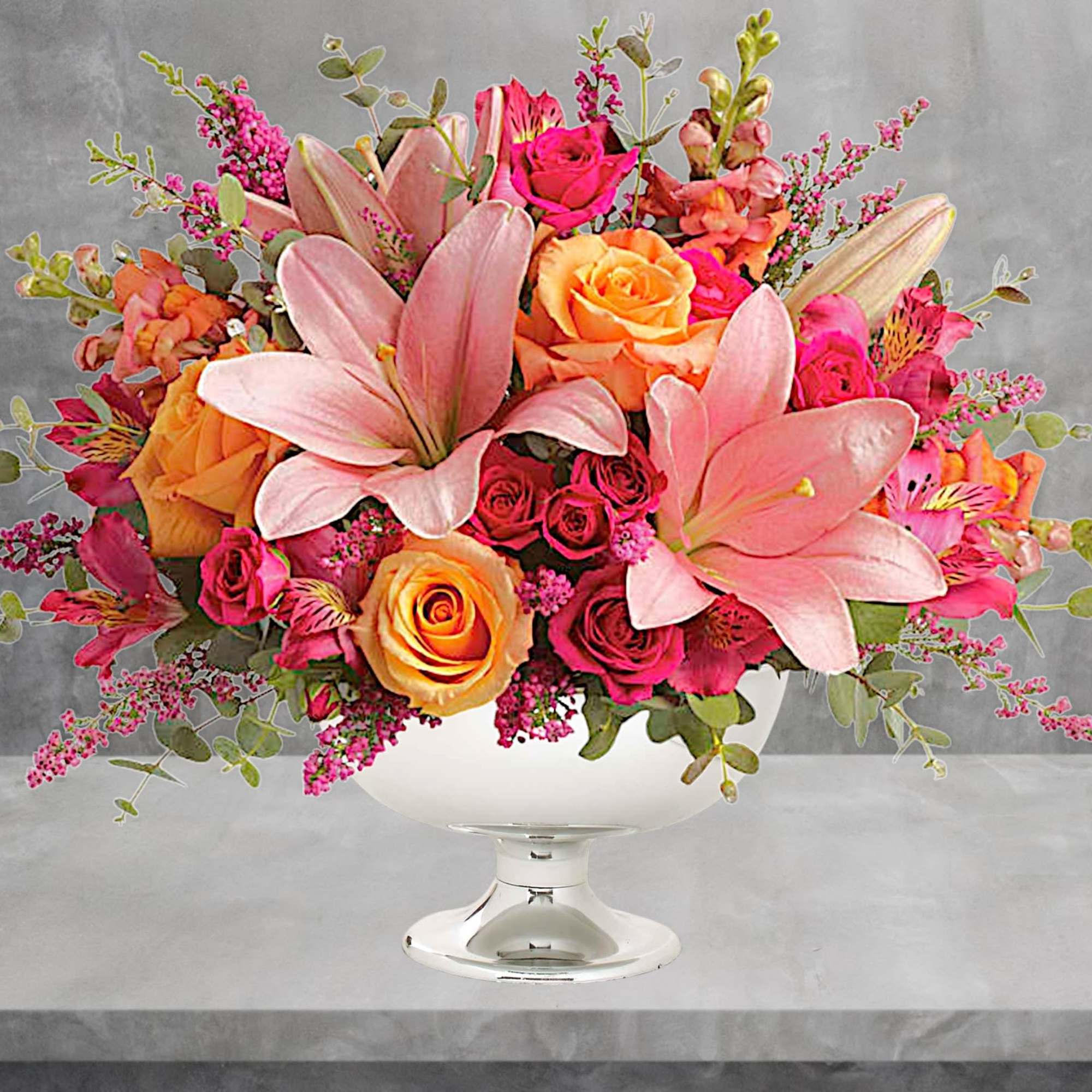 Just peachy! Pale pink &amp; orange blooms are gathered in a silver
