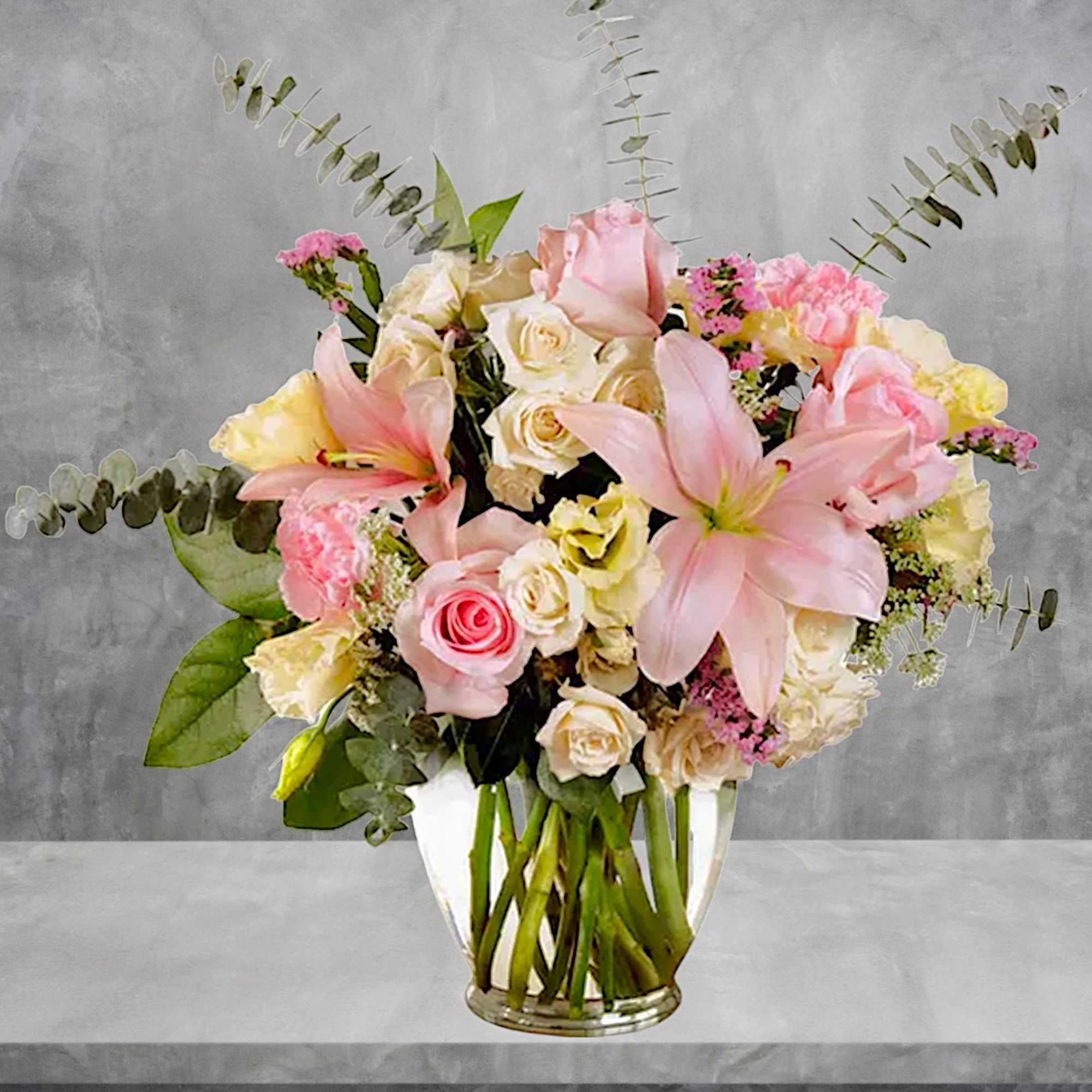 A perfectly pleasing mix of sweet feminine blossoms make this a truly