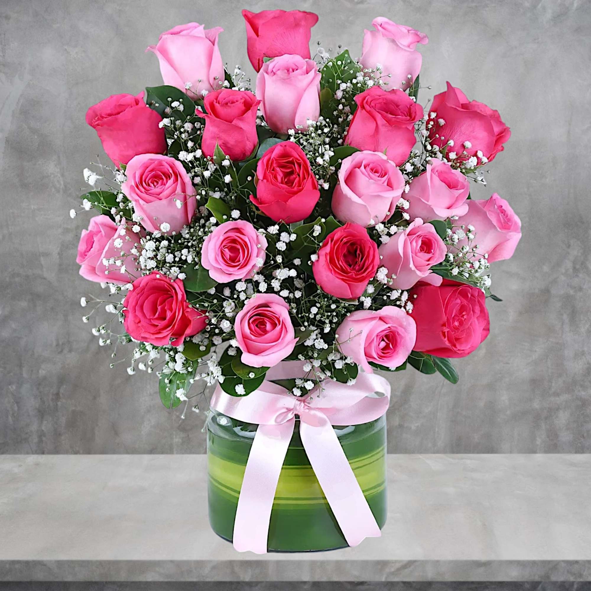 This trendy, high-fashion mix of hot pink roses, and pink roses, is