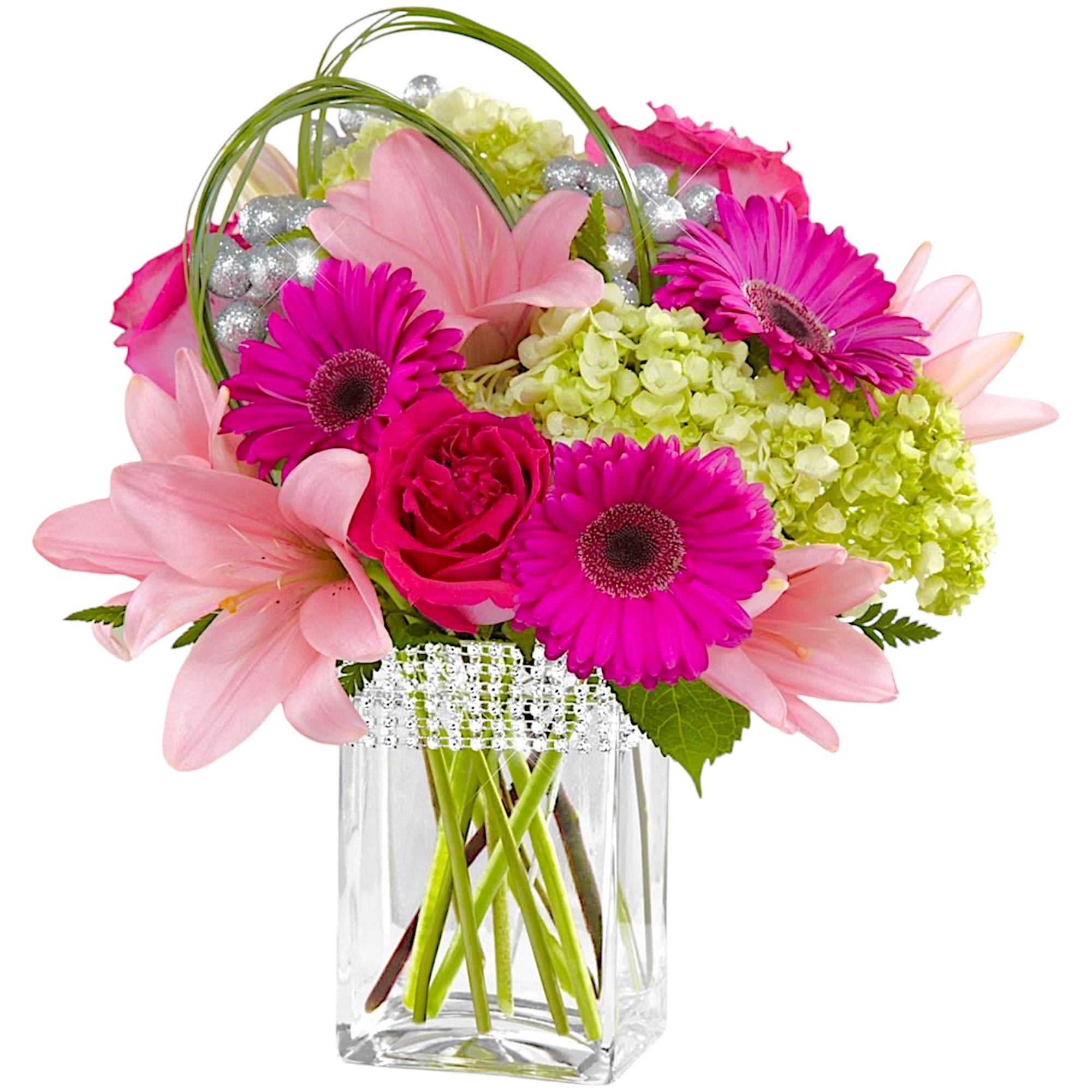 The Blooming Bliss arrangement showcases blushing blooms and definitive style to send