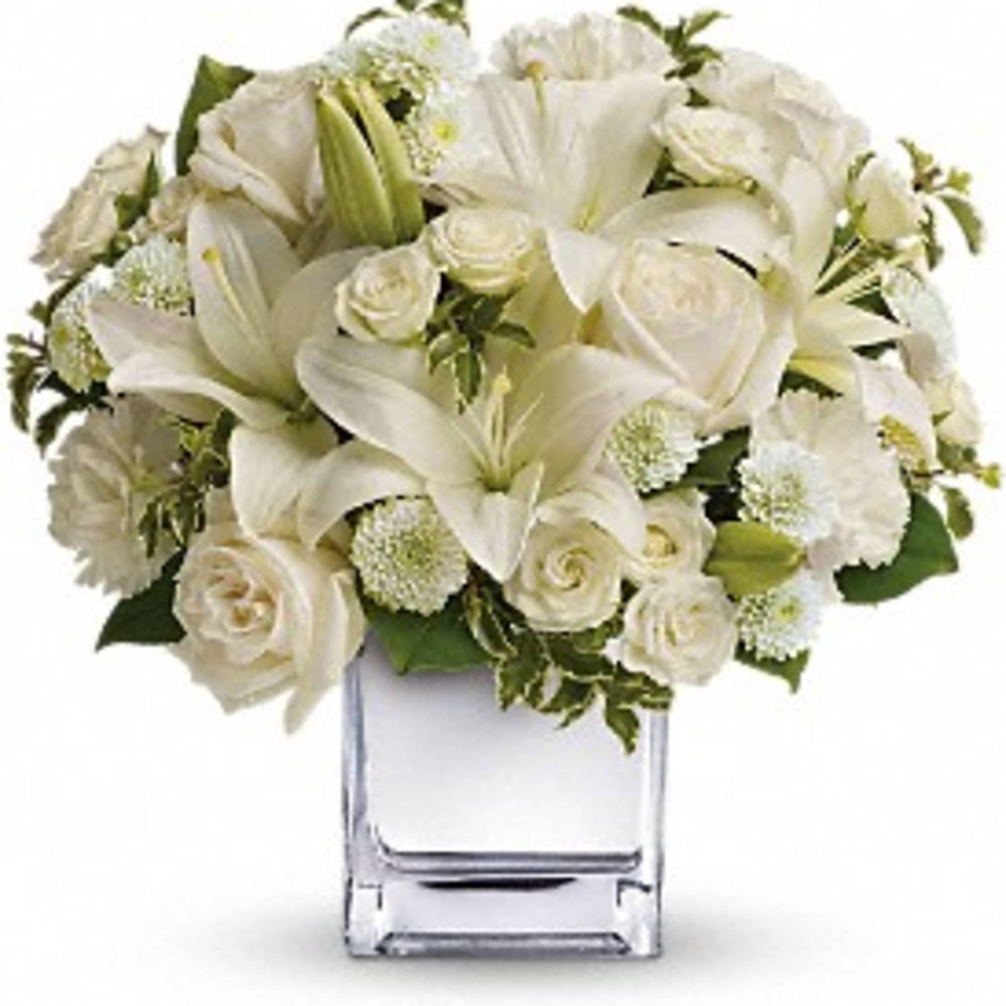 Surprise a faraway friend with this elegant array of Christmas flowers. White