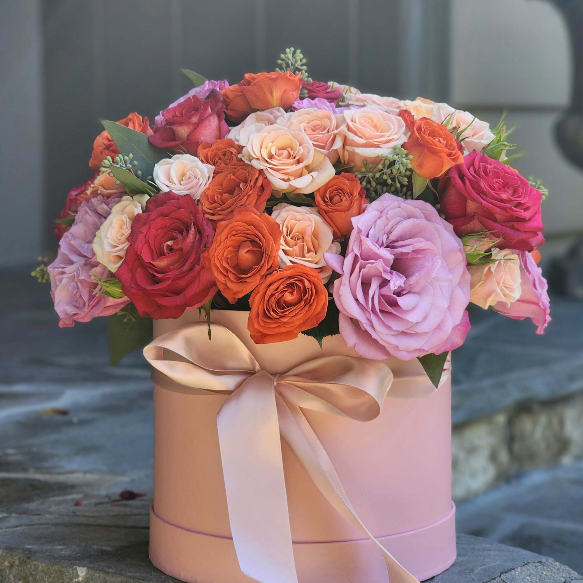 A luxurious arrangement indeed! Mixing bright colors like hot pink and lavander